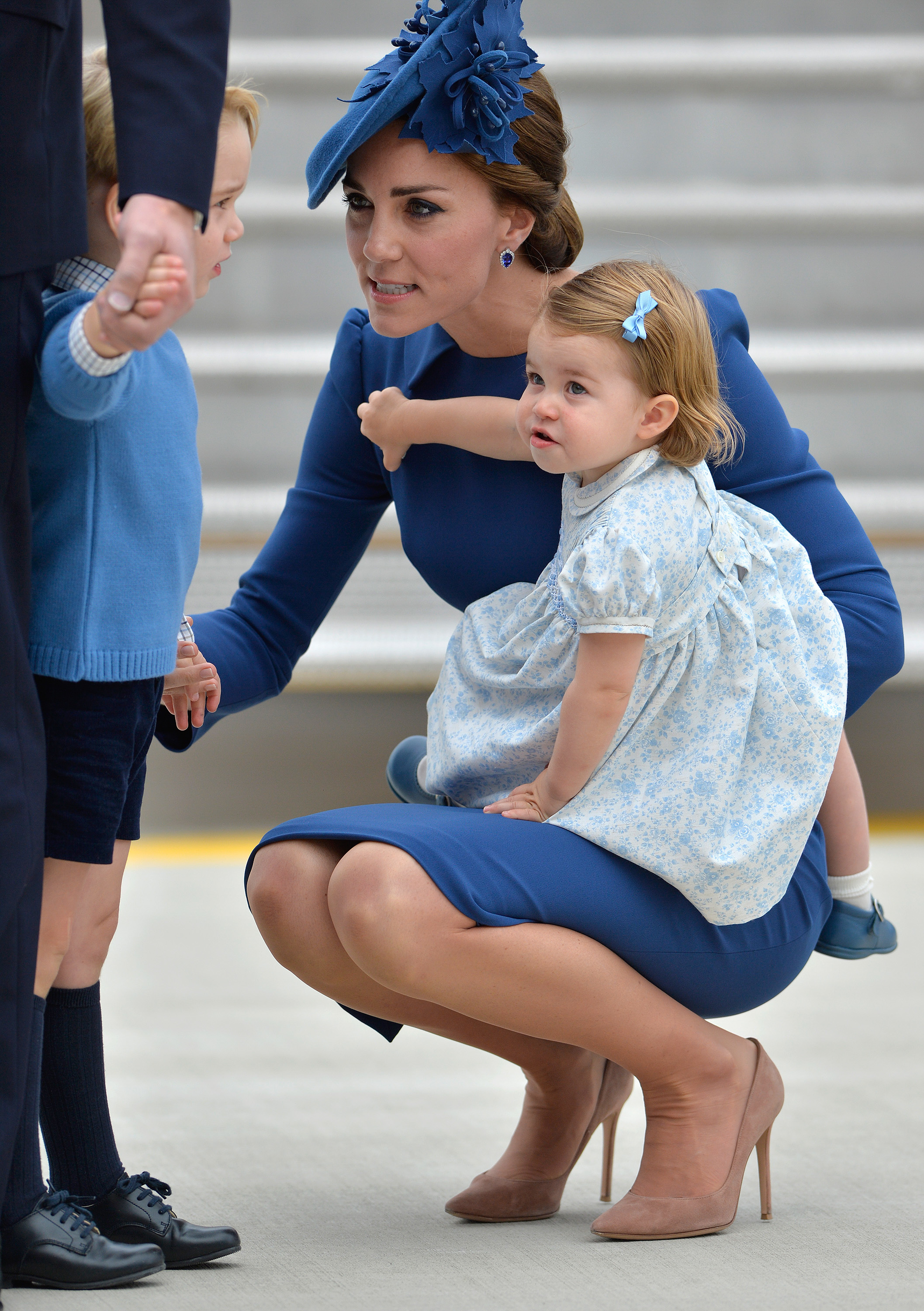 Princesses Catherine, Princess Charlotte, and Prince George at Victoria Airport for the Royal Tour on September 24, 2016, in Canada. | Source: Getty Images