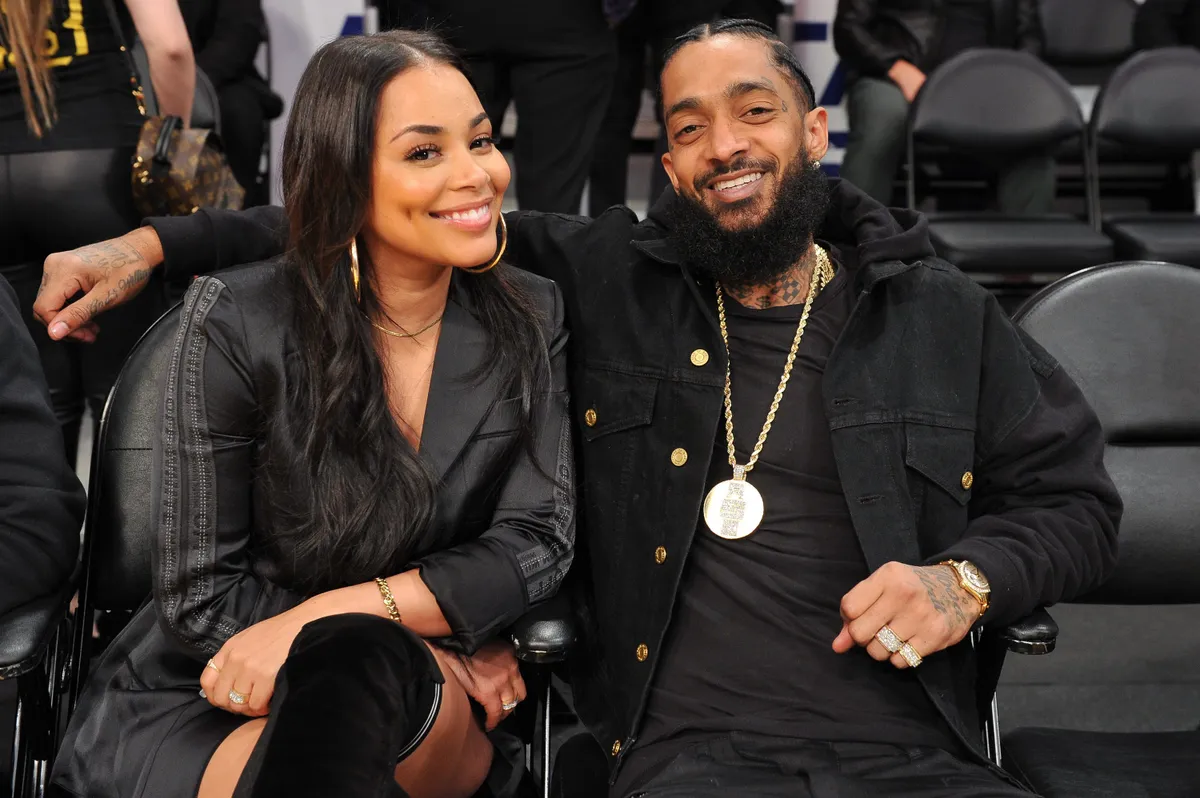 Nipsey Hussle and Lauren London attend a basketball game at Staples Center on November 14, 2018. | Photo: Getty Images