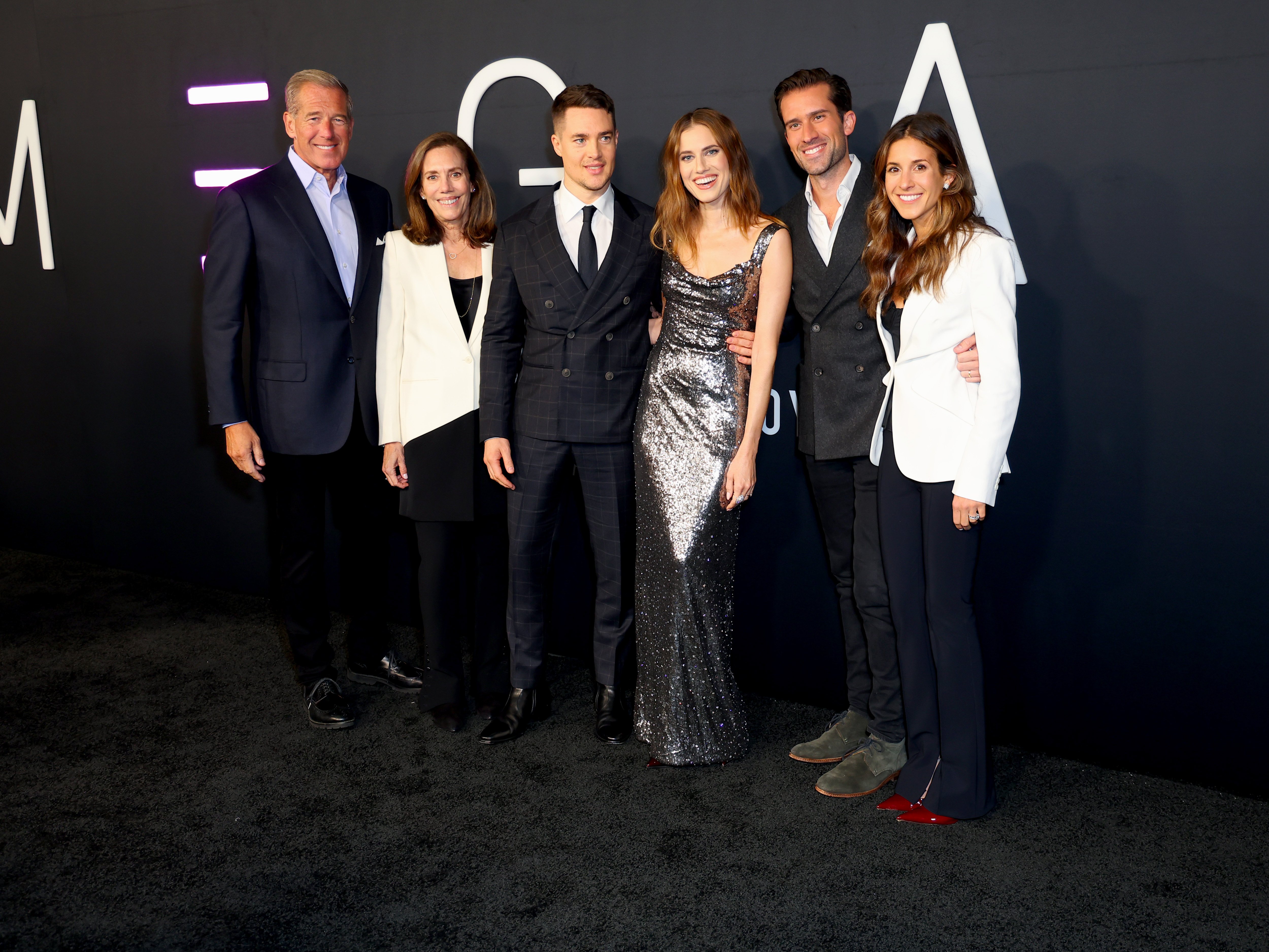 Brian Williams, Jane Stoddard Williams, Alexander Dreymon, Allison Williams, Douglas Williams, and Emily Altieri attend the Los Angeles Premiere Of Universal Pictures' "M3GAN" at TCL Chinese Theatre on December 7, 2022, in Hollywood, California. | Source: Getty Images