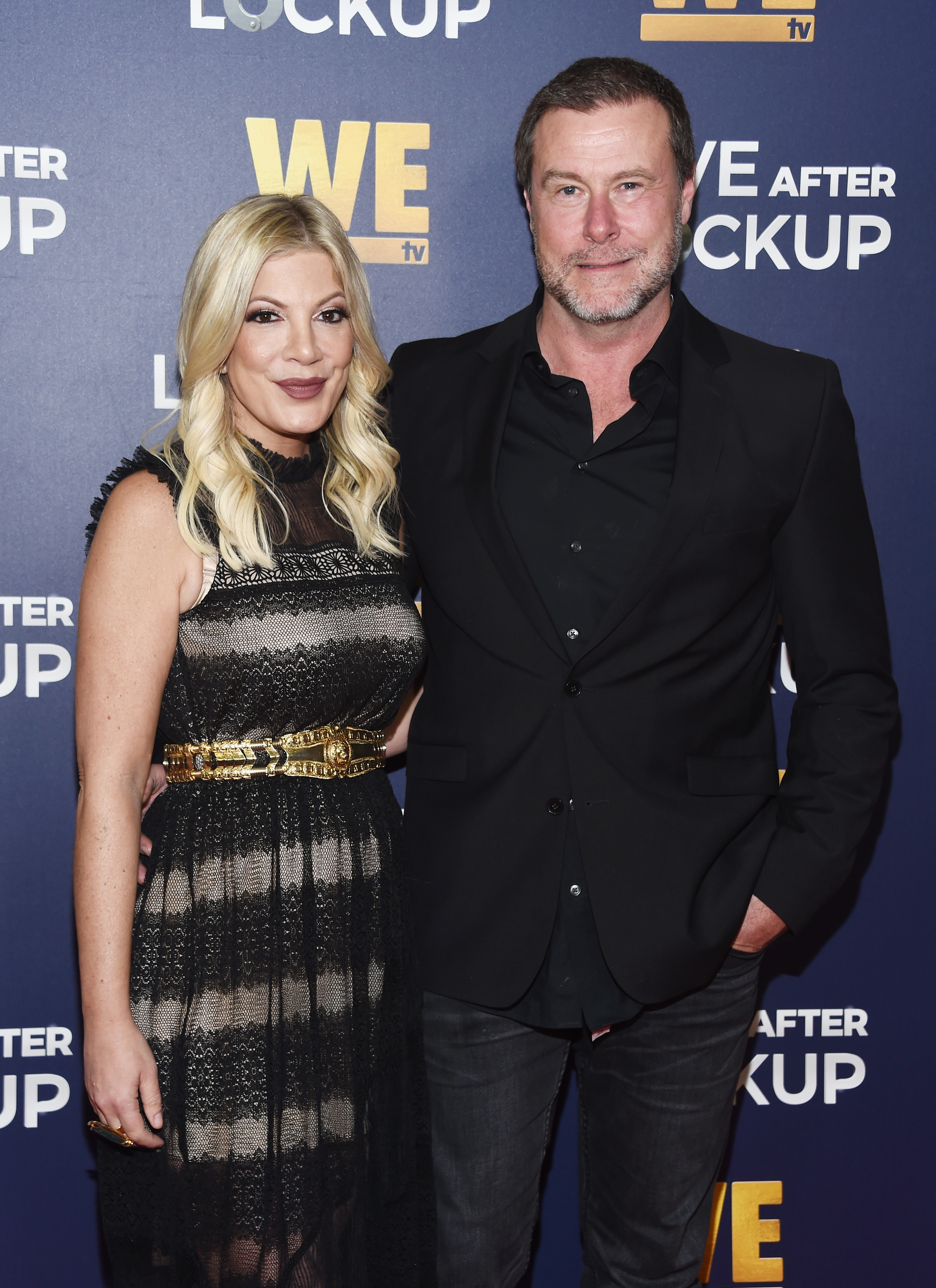 Tori Spelling and Dean McDermott arrive at a WE tv event in Beverly Hills, California, on December 11, 2018 | Source: Getty Images