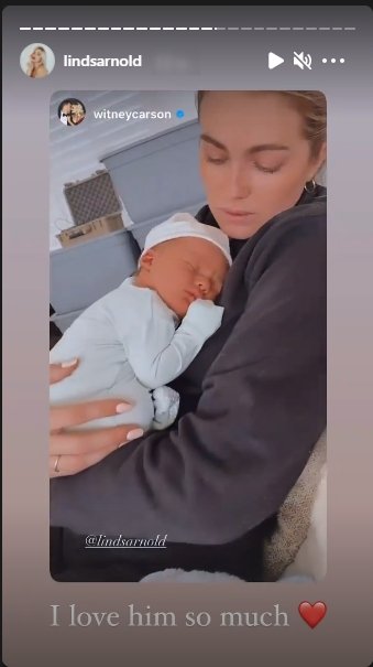 Lindsay Arnold holding Witney Carson's newborn son, Leo, on January 12, 2021. | Source: Instagram/lindsarnold.