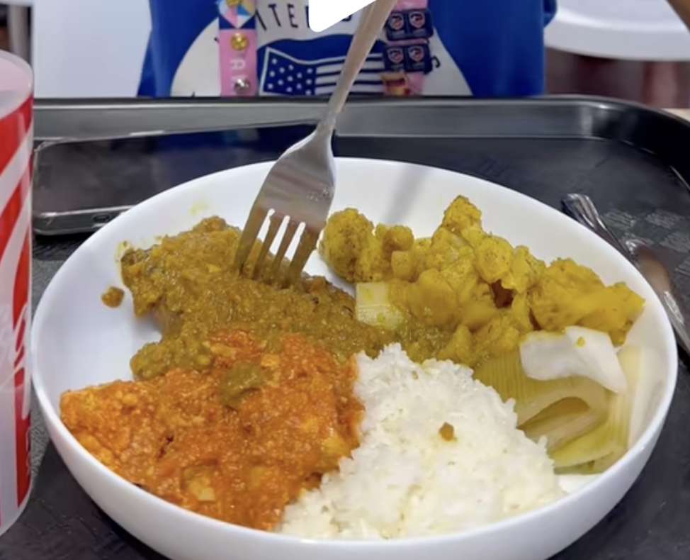 A screenshot of a meal at the Olympic Village dining hall posted by Lee Kiefer and Gerek Meinhardt | Source: TikTok/oldmarriedolympians