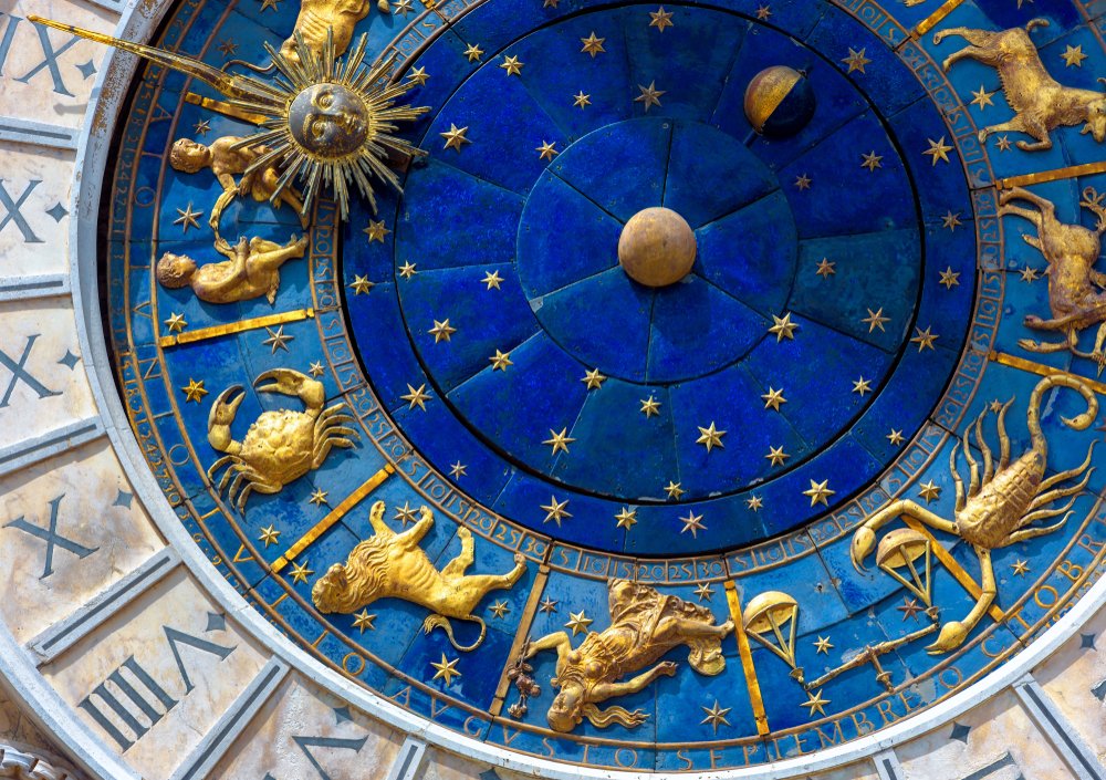 Astrological signs on ancient clock Torre dell'Orologio | Source: Shutterstock