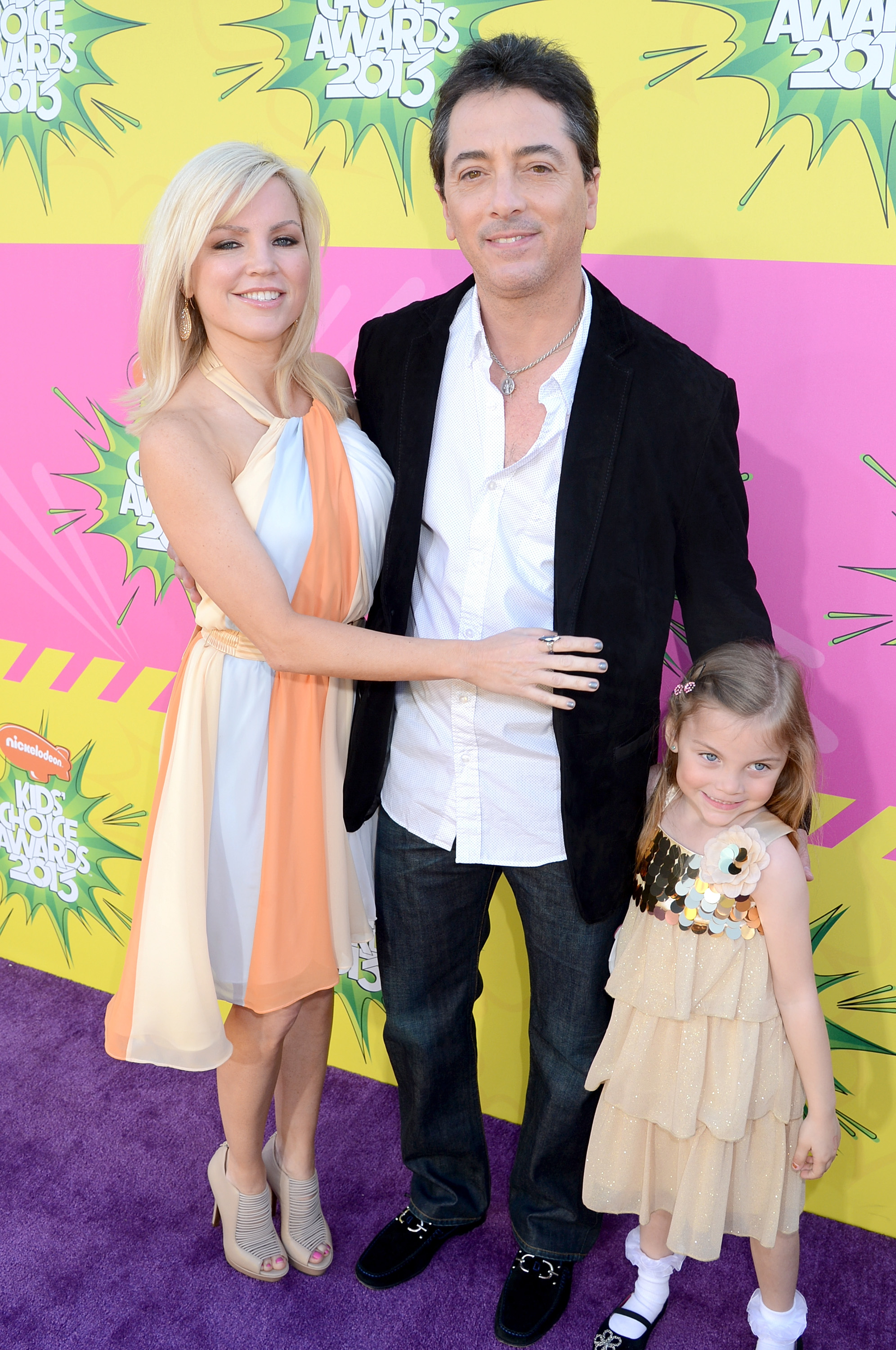 Renee Sloan, Scott Baio, and daughter Bailey arrive at Nickelodeon's 26th Annual Kids' Choice Awards at USC Galen Center in Los Angeles, California, on March 23, 2013 | Source: Getty Images