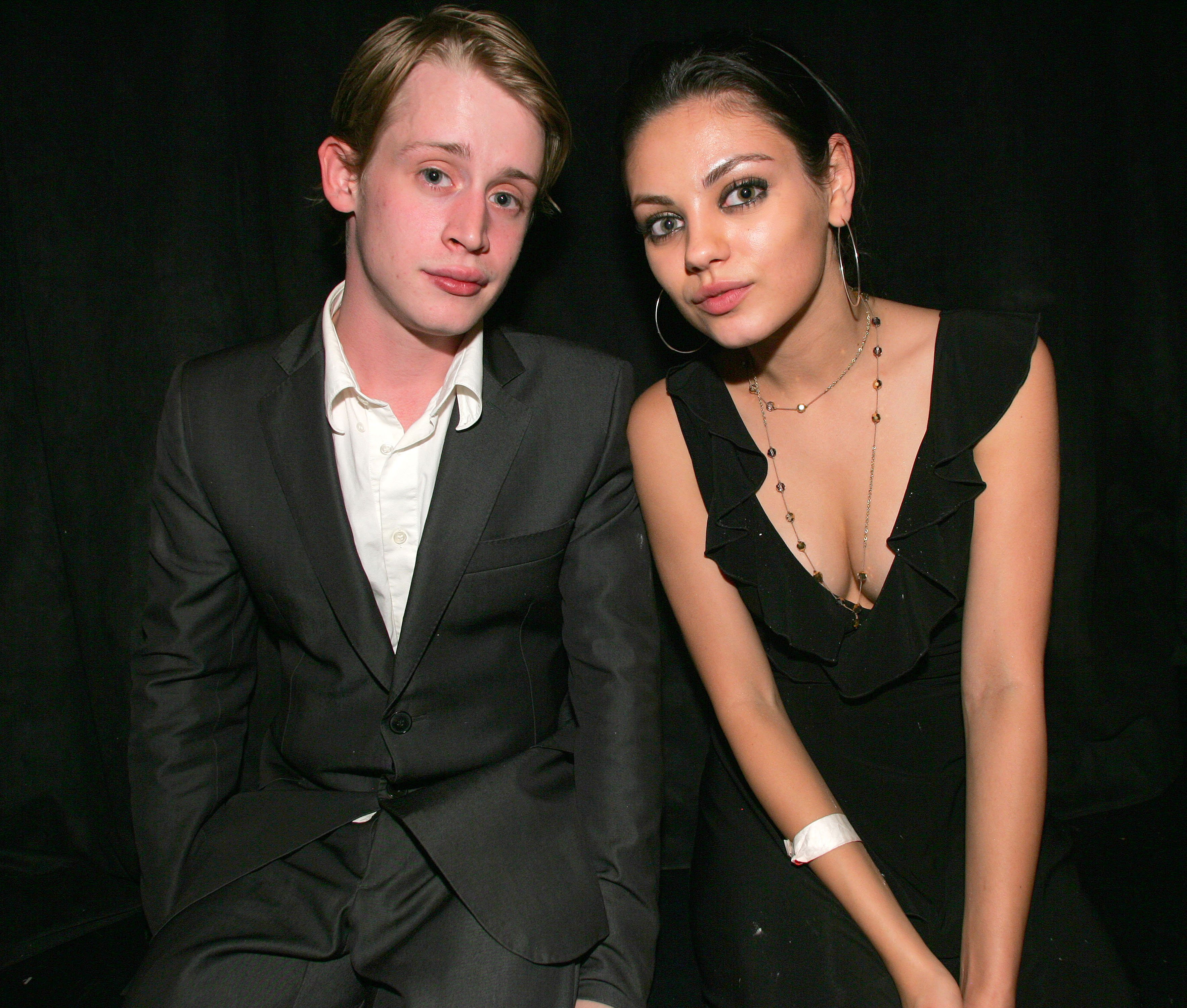 Macaulay Culkin and Mila Kunis at the Launch Celebrity Auction to Benefit Hurricane Victims in 2005 | Source: Getty Images