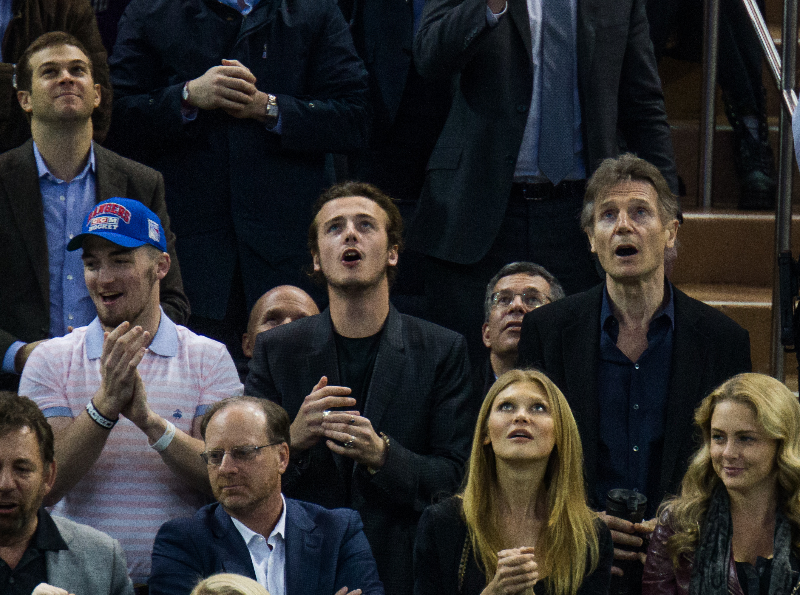 Daniel Neeson, Micheál Richardson and Liam Neeson at a New York Rangers Vs. Boston Bruins game in New York City on March 23, 2016 | Source: Getty Images