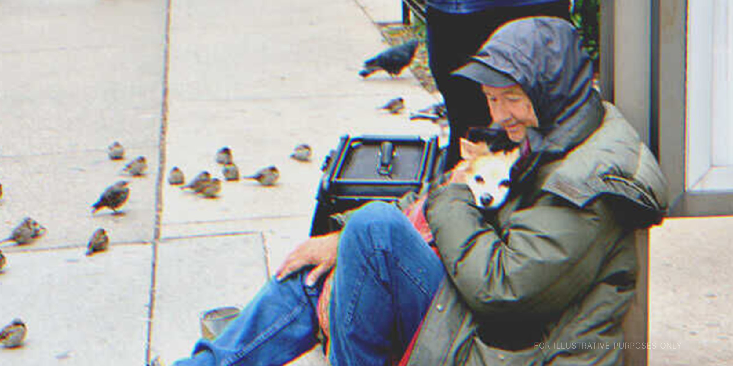 Beggar hugs his pet dog | Source: Shutterstock