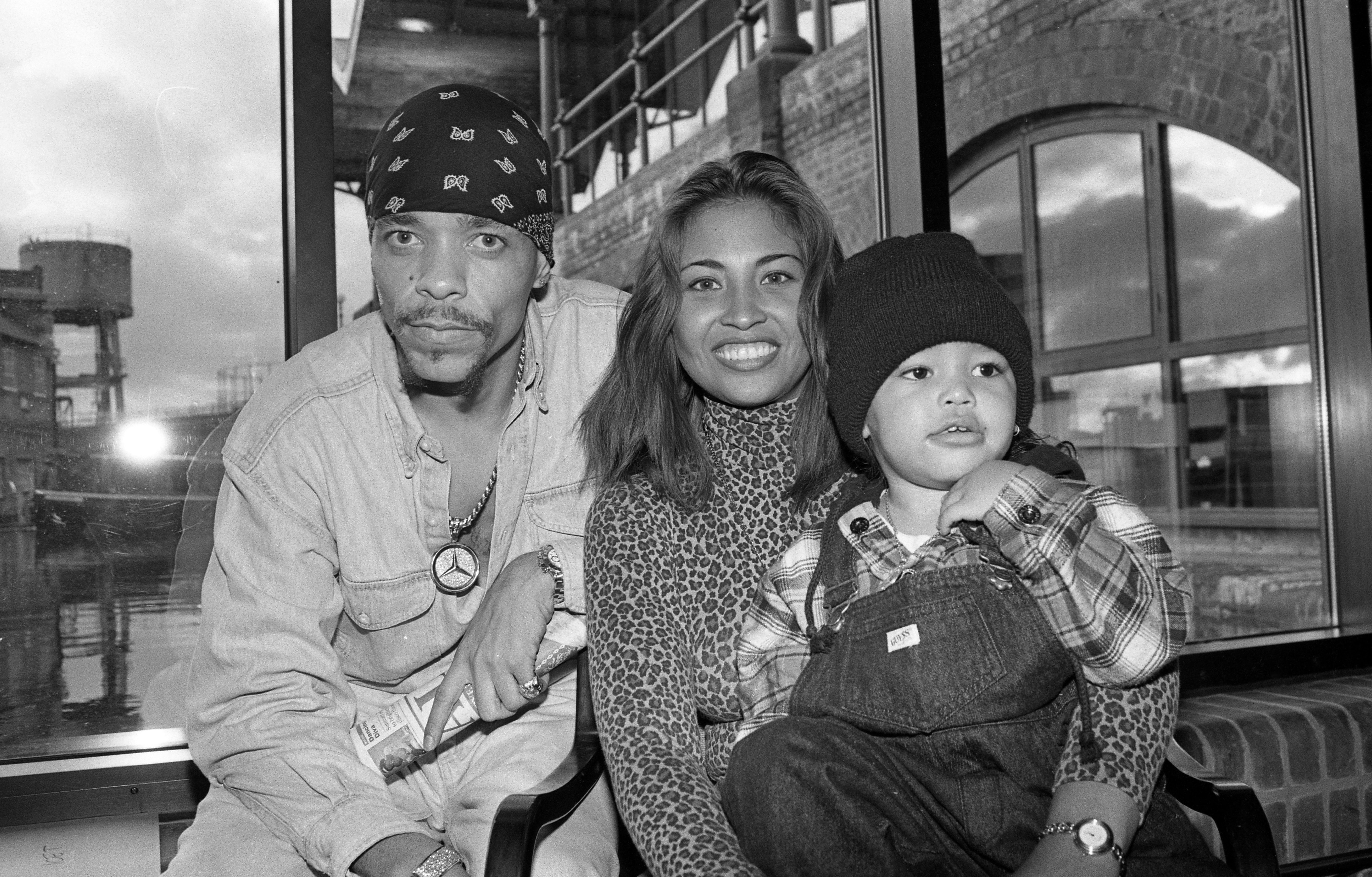 The couple poses with their son Tracy Marrow Jr. in 1993 | Source: Getty Images