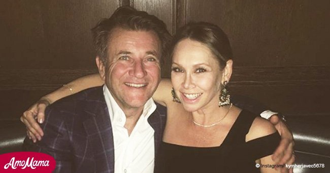 'DWTS' pro Kym Johnson stuns in a tight black dress exposing huge twins' baby bump in frank pics
