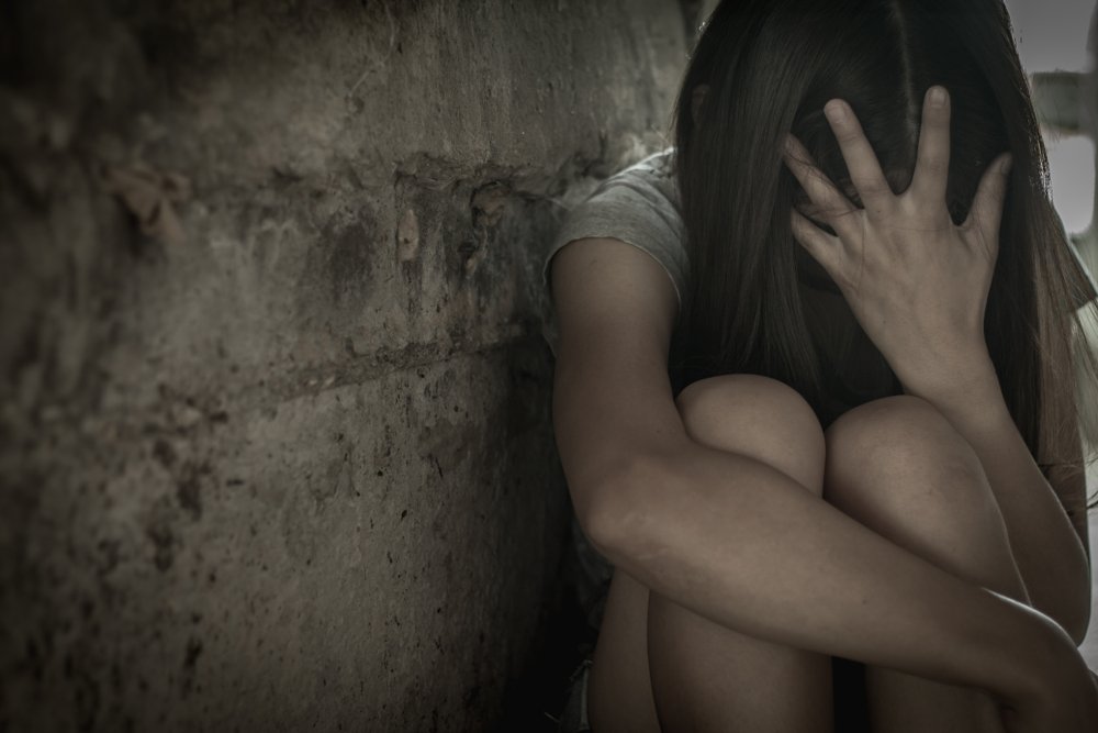 A photo of a girl that depicts human trafficking | Photo: Shutterstock