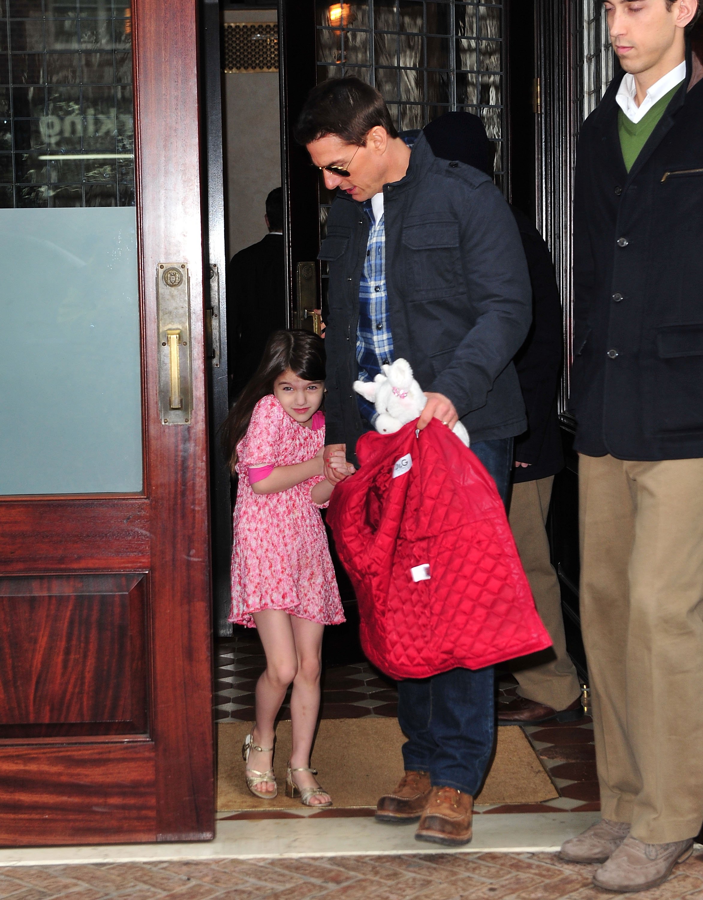 Tom Cruise and Suri Cruise seen on the streets of Manhattan on December 16, 2011 in New York City. | Source: Getty Images