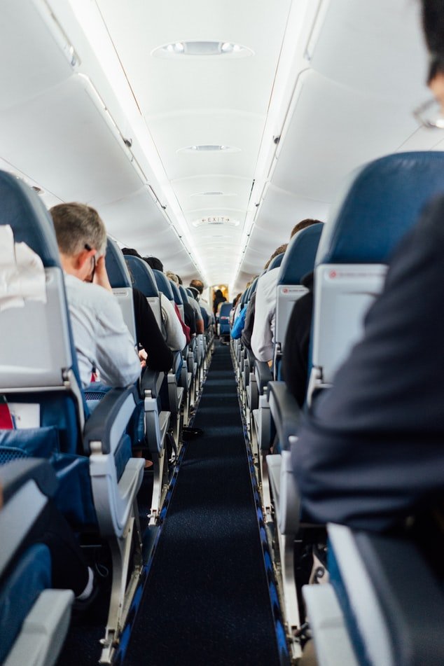 Richard's parents were sitting next to each other on the plane, but he was sitting in the other part of the plane, far from them | Source: Unsplash