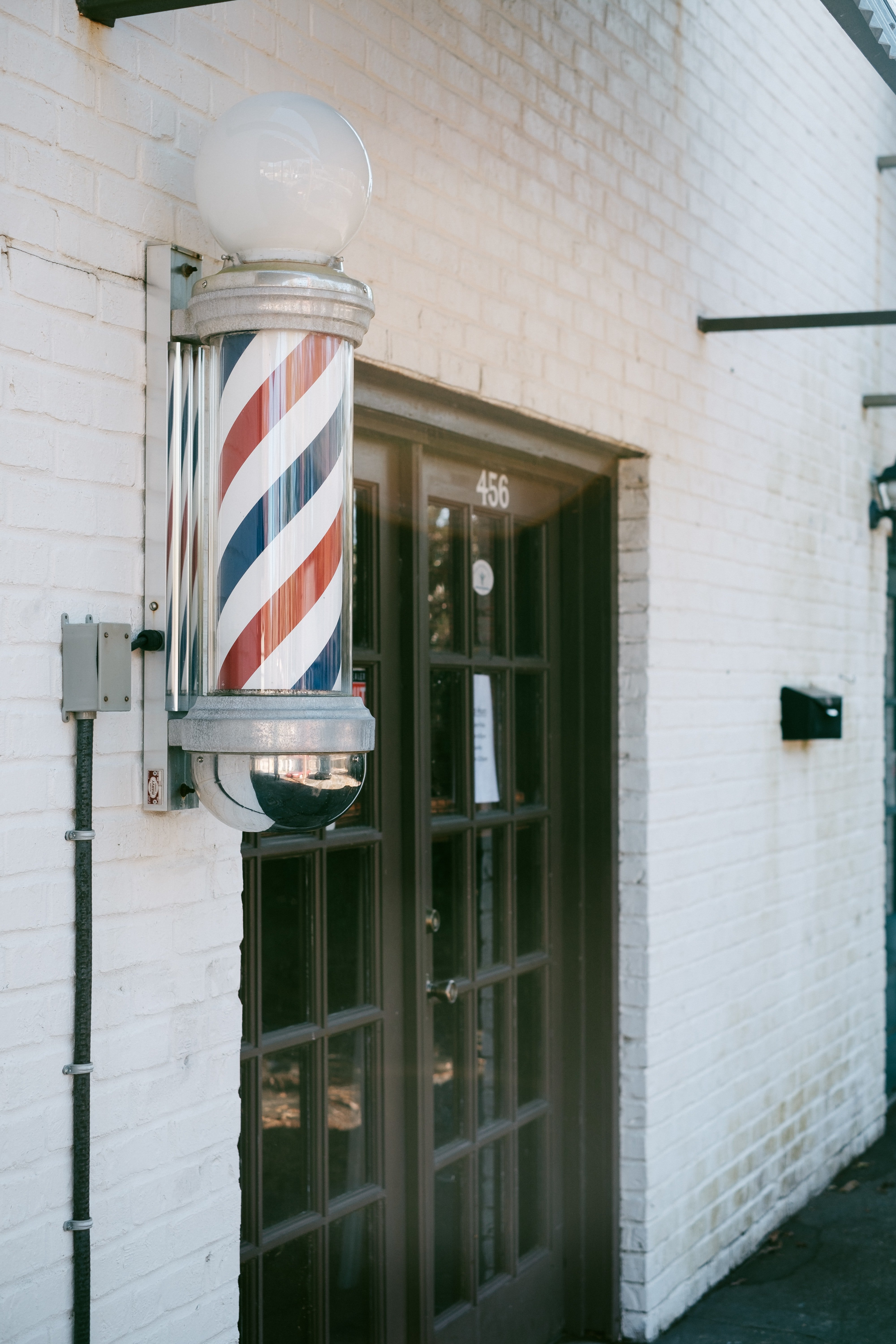 Jordan saw an old-fashioned barber-shop. | Source: Unsplash