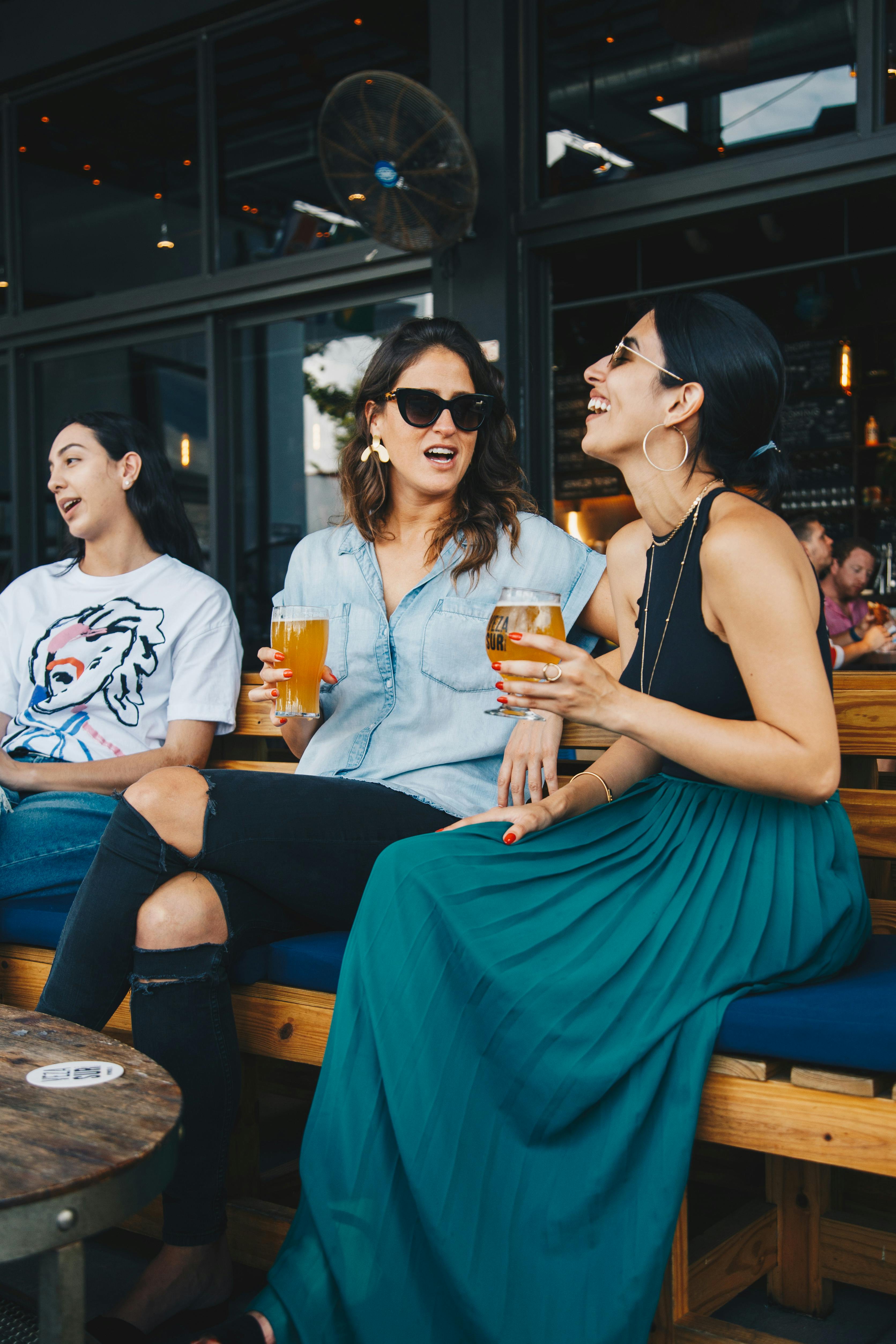 Woman laughing with her friends | Source: Pexels