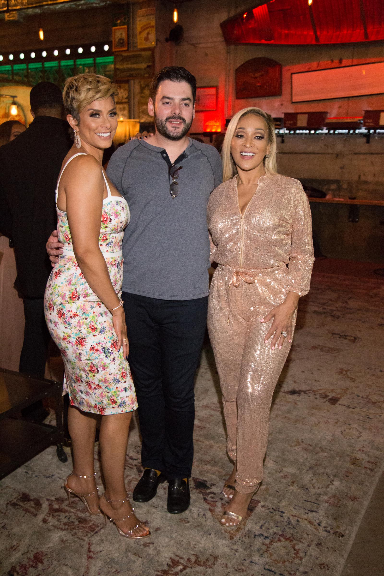 Robyn Dixon, Matthew Byars, and Karen Huger at the "Real Housewives of Potomac" premiere party in Washington, DC on April 28, 2019 | Source: Getty Images