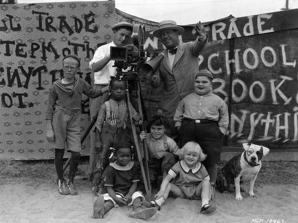 Film director Robert McGowan and cinematographer Art Lloyd (1896 - 1954) seen with the child stars of his "Our Gang" film series, otherwise known as the "Little Rascals" on January 01, 1928 | Photo: Getty Images