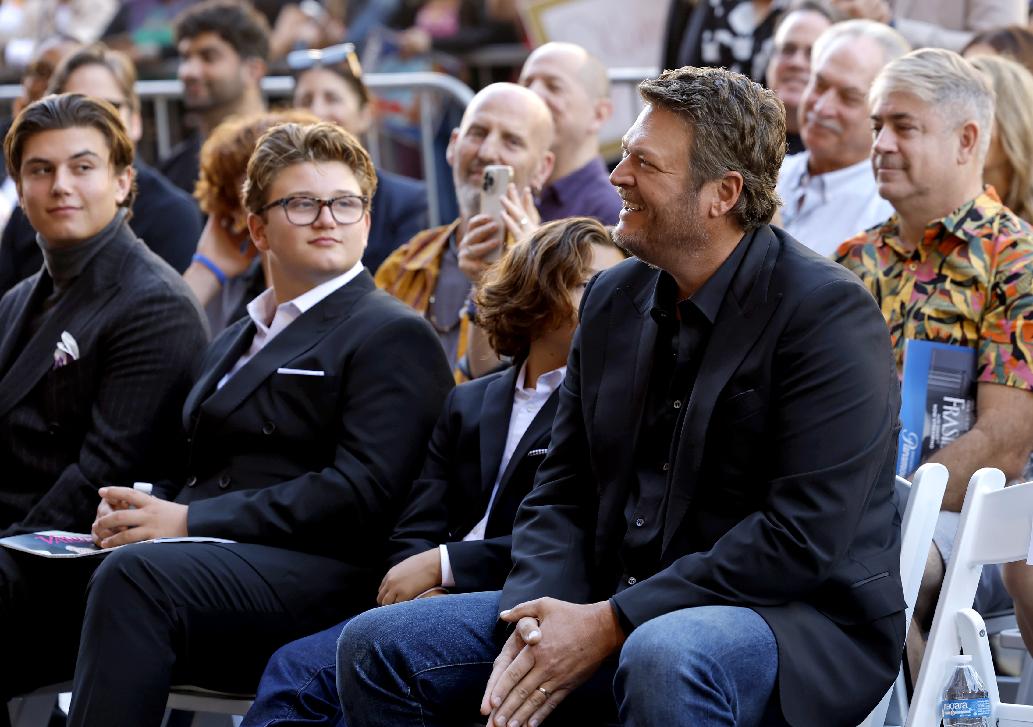 Kingston, Zuma, and Apollo Rossdale with Blake Shelton at Gwen Stefani's Hollywood Walk of Fame star ceremony in Los Angeles, California on October 19, 2023 | Source: Getty Images