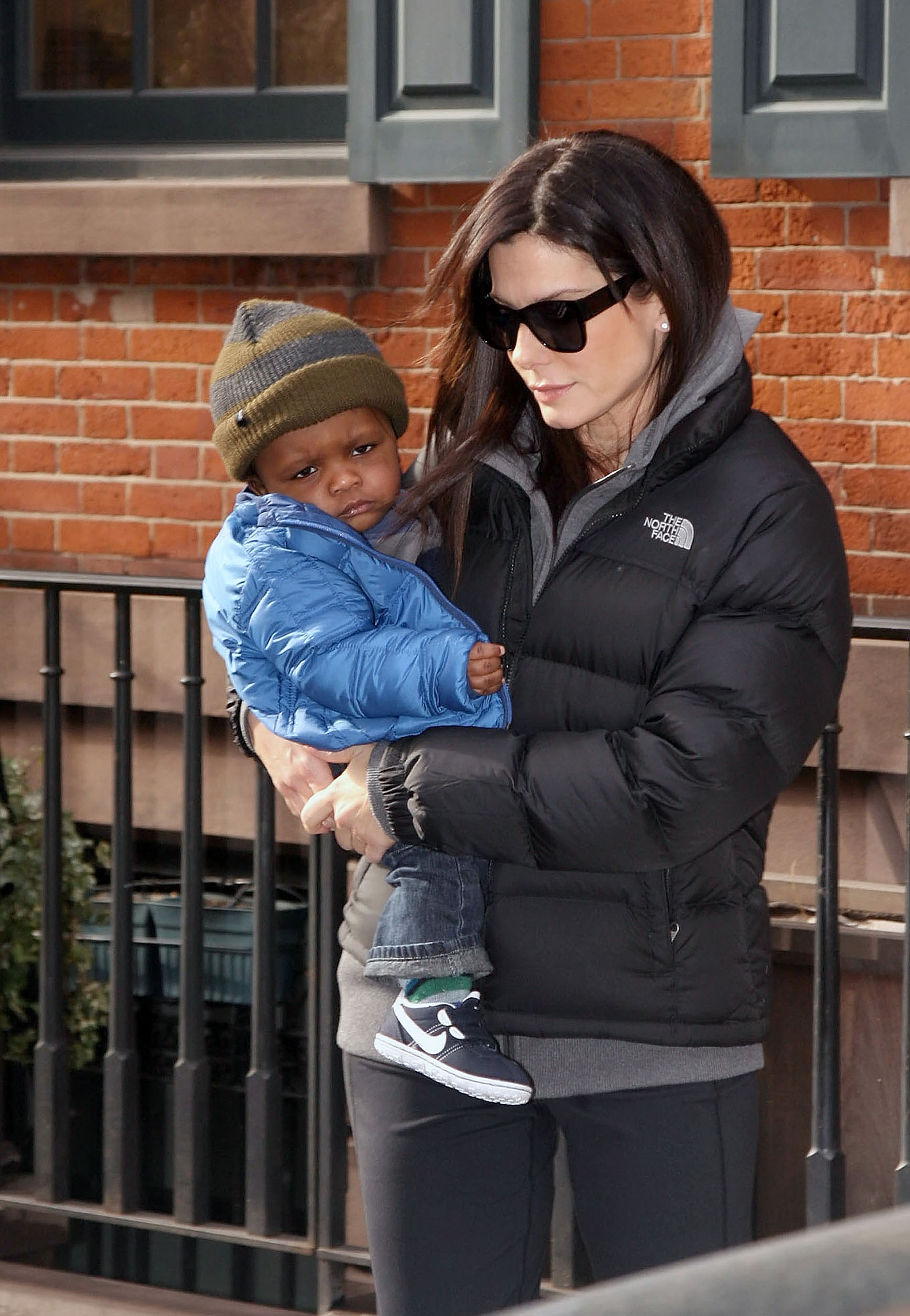 Sandra Bullock with her son, Louis Bardo Bullock, in New York on January 20, 2011. | Source: Getty Images