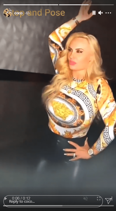A screenshot from a clip of Coco Austin dancing at the club in her Versace top. | Photo: Instagram.com/Coco