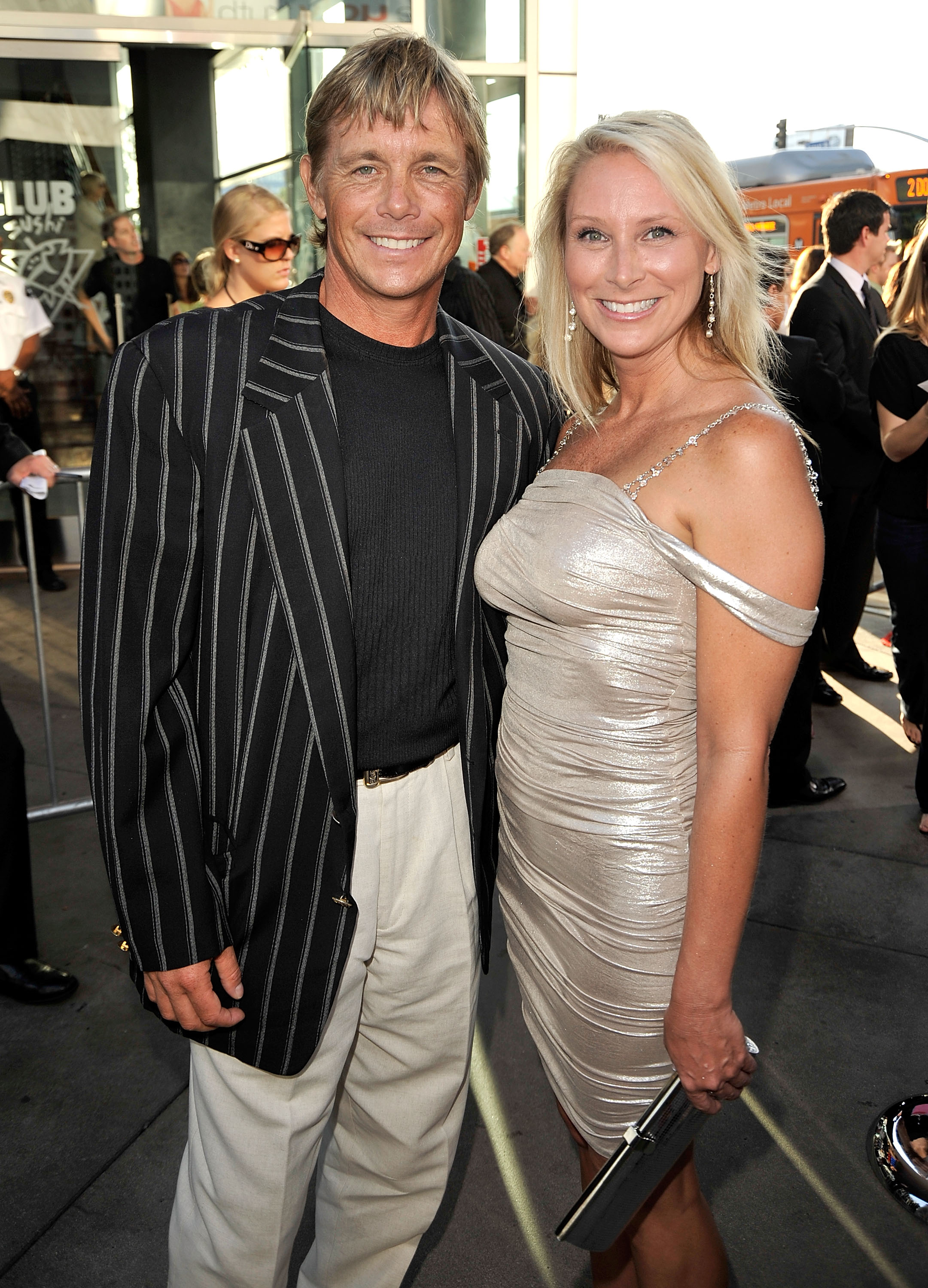 Christopher Atkins and guest arrive at the premiere of Columbia Pictures' "The Ugly Truth" on July 16, 2009 | Source: Getty Images