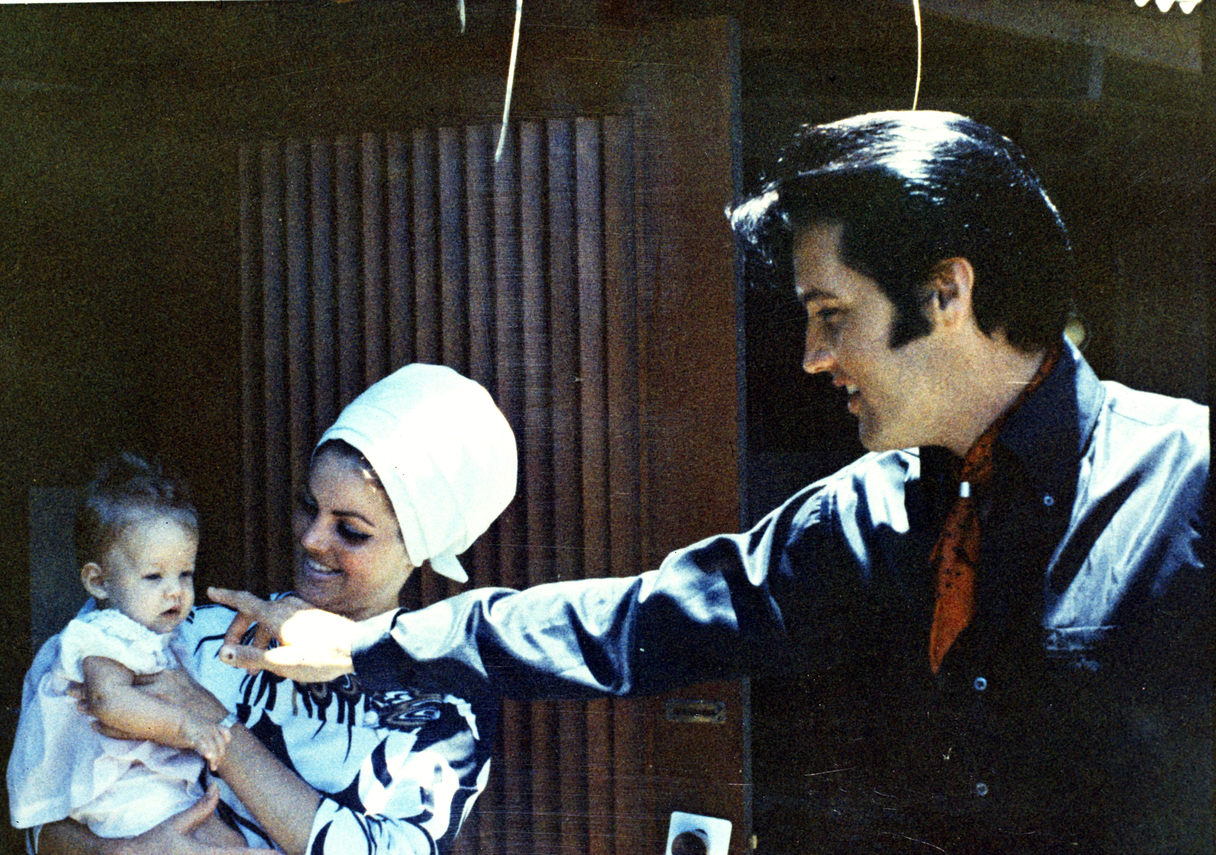 Lisa Marie Presley, Priscilla Presley, and Elvis Presley at home in 1968 | Source: Getty Images