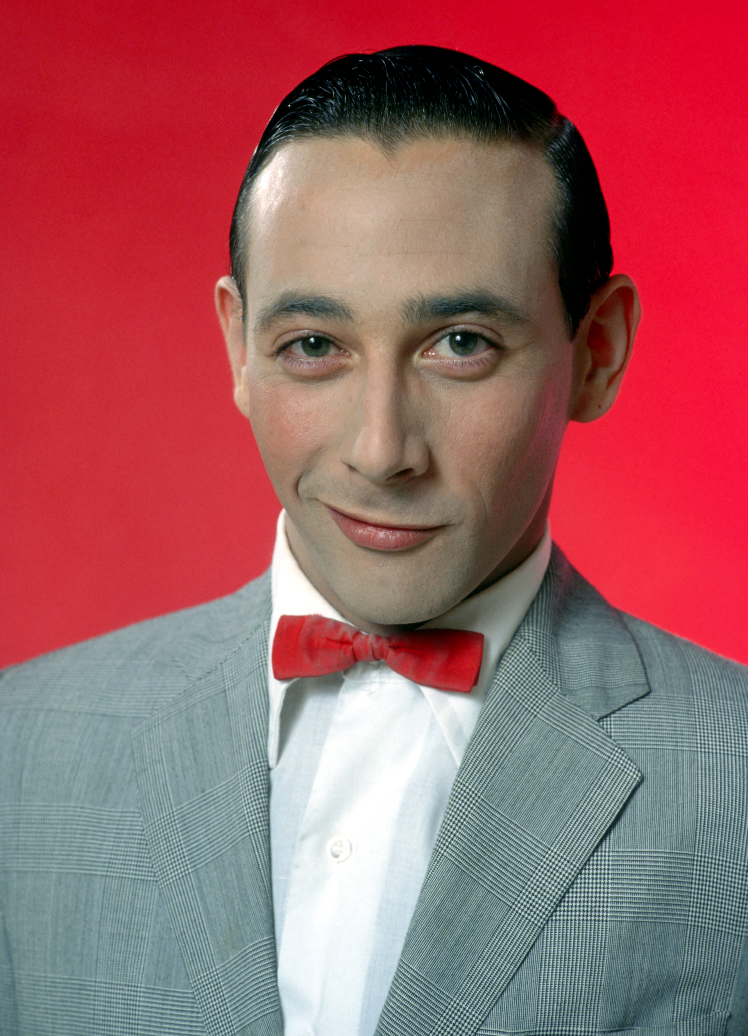 Paul Reubens dressed as Pee-Wee Herman in 1980 | Source: Getty Images