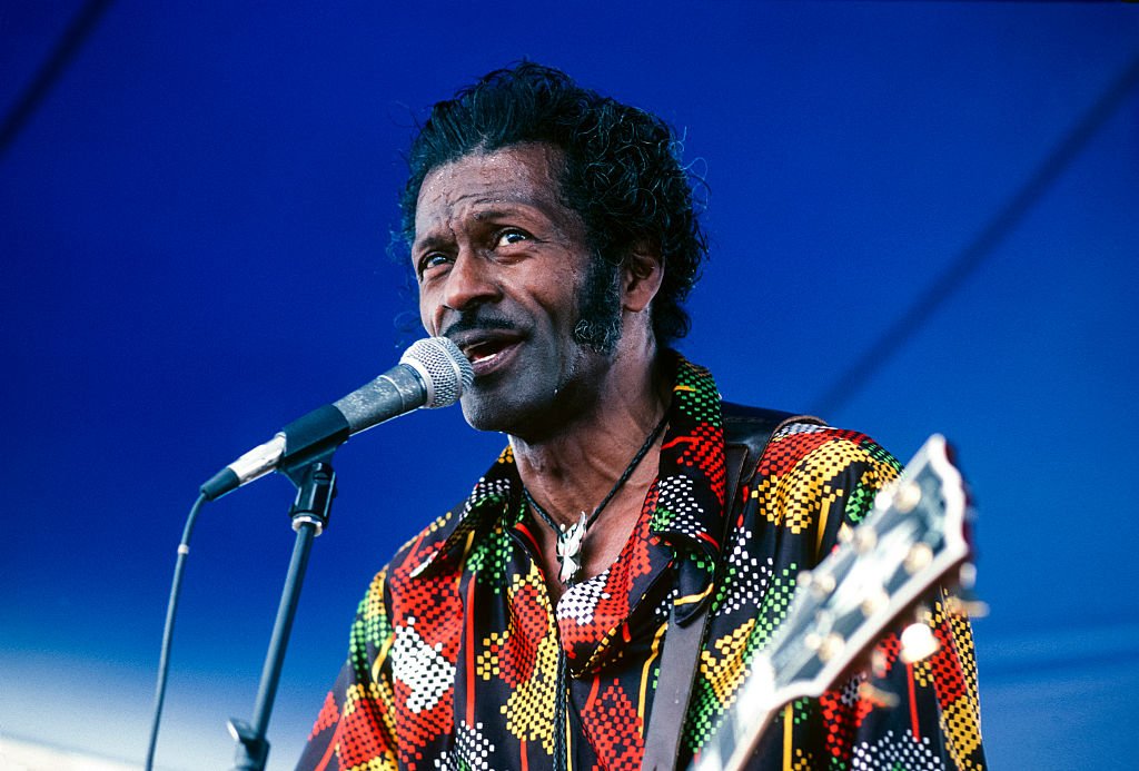 American R&B and Rock musician Chuck Berry performs onstage at the New Orleans Jazz & Heritage Festival, May 1981. | Photo: Getty Images