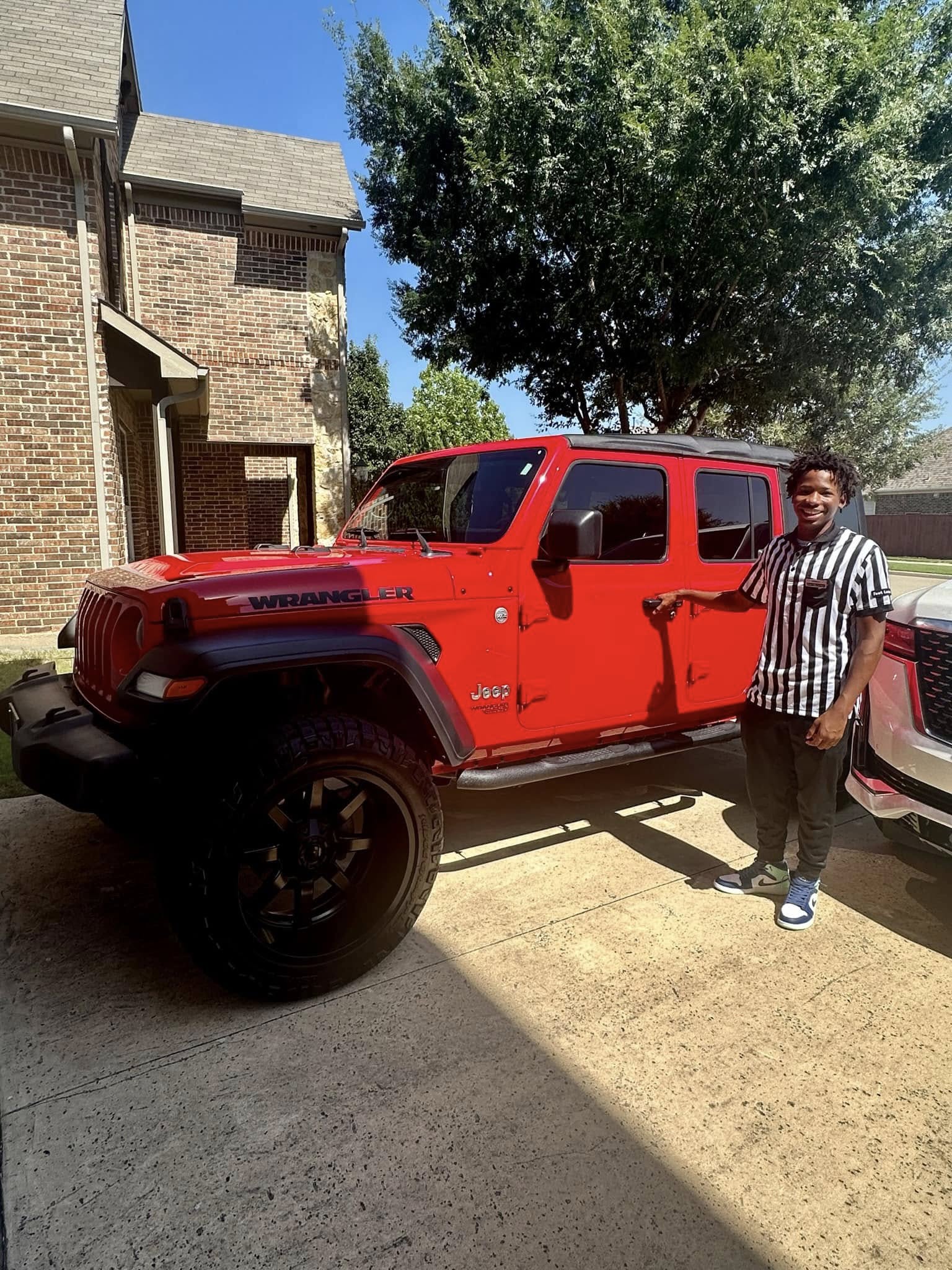 Images tied to Karmelo Anthony's family helped fuel public interest in the lifestyle they appeared to have before the legal case. The red Jeep became one of the vehicle photos that pushed online discussion toward questions about money, image, and perception. | Source: Facebook/Drew Anthony