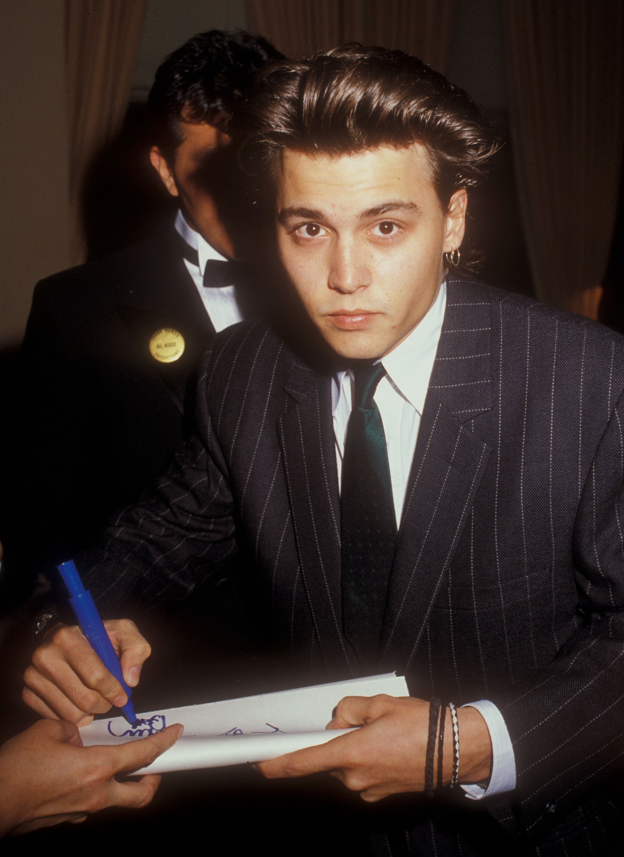 Johnny Depp at the Us Benefit in Los Angeles, California taken May 13, 1988 in Los Angeles, California | Source: Getty Images