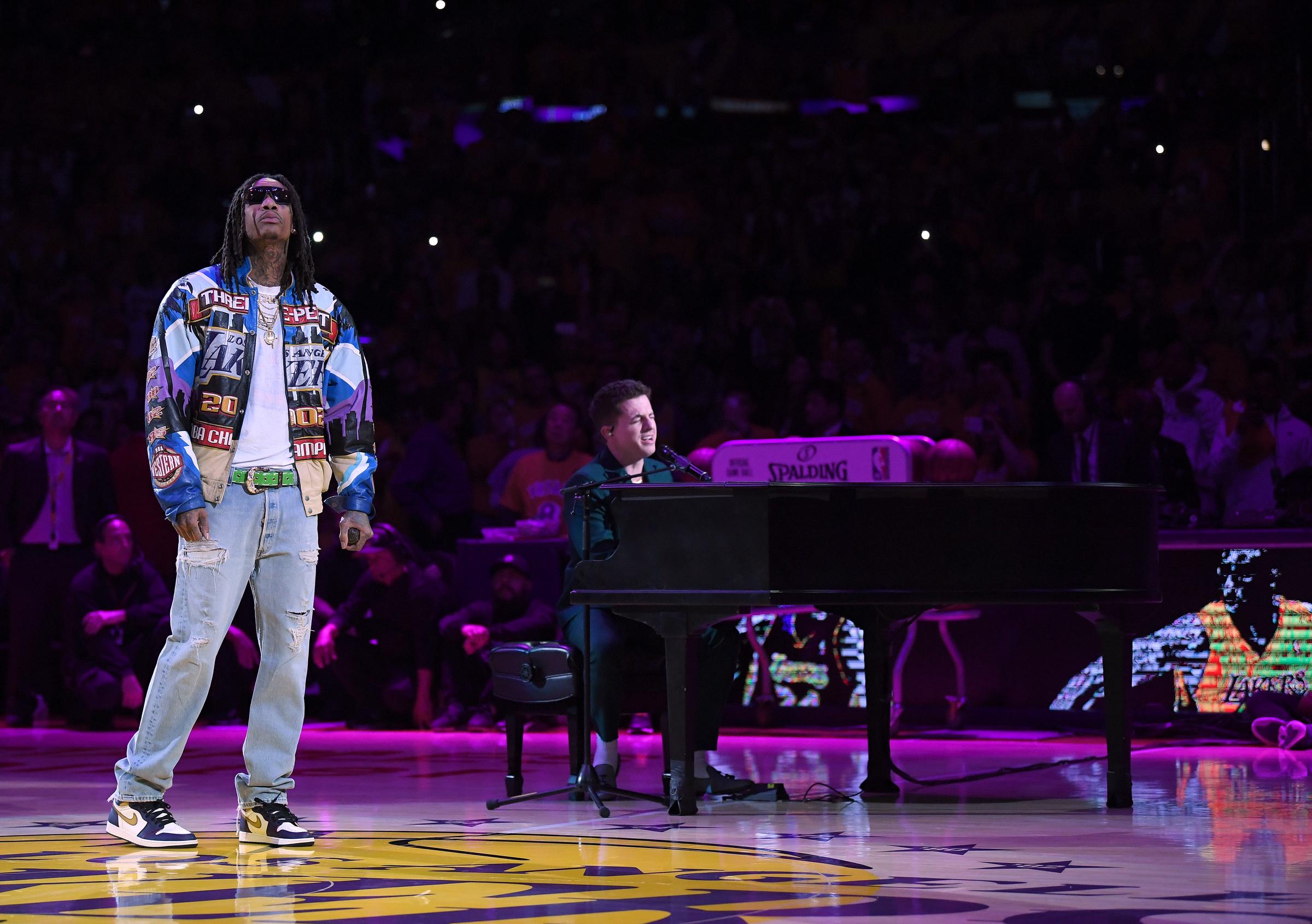 Wiz Khalifa and Charlie Puth performing "See You Again" as a tribute to Kobe Bryant during halftime of the game between the Portland Trail Blazers and the Los Angeles Lakers at Staples Center on January 31, 2020, in Los Angeles, California. | Source: Getty Images