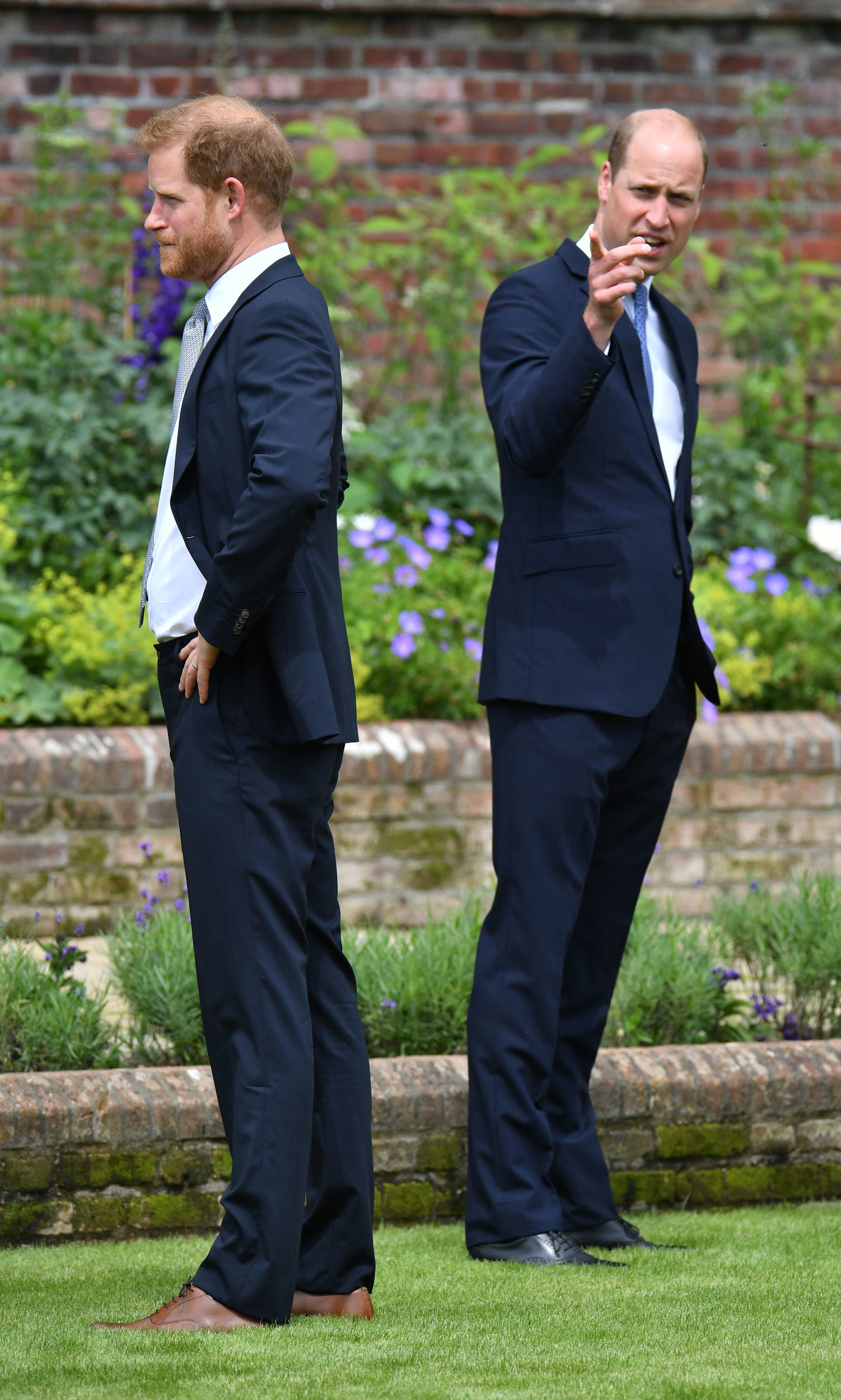 Prince Harry, Duke of Sussex, and Prince William, Duke of Cambridge during the unveiling of a statue they commissioned of Diana, Princess of Wales in London, England, on July 1, 2021 | Source: Getty Images