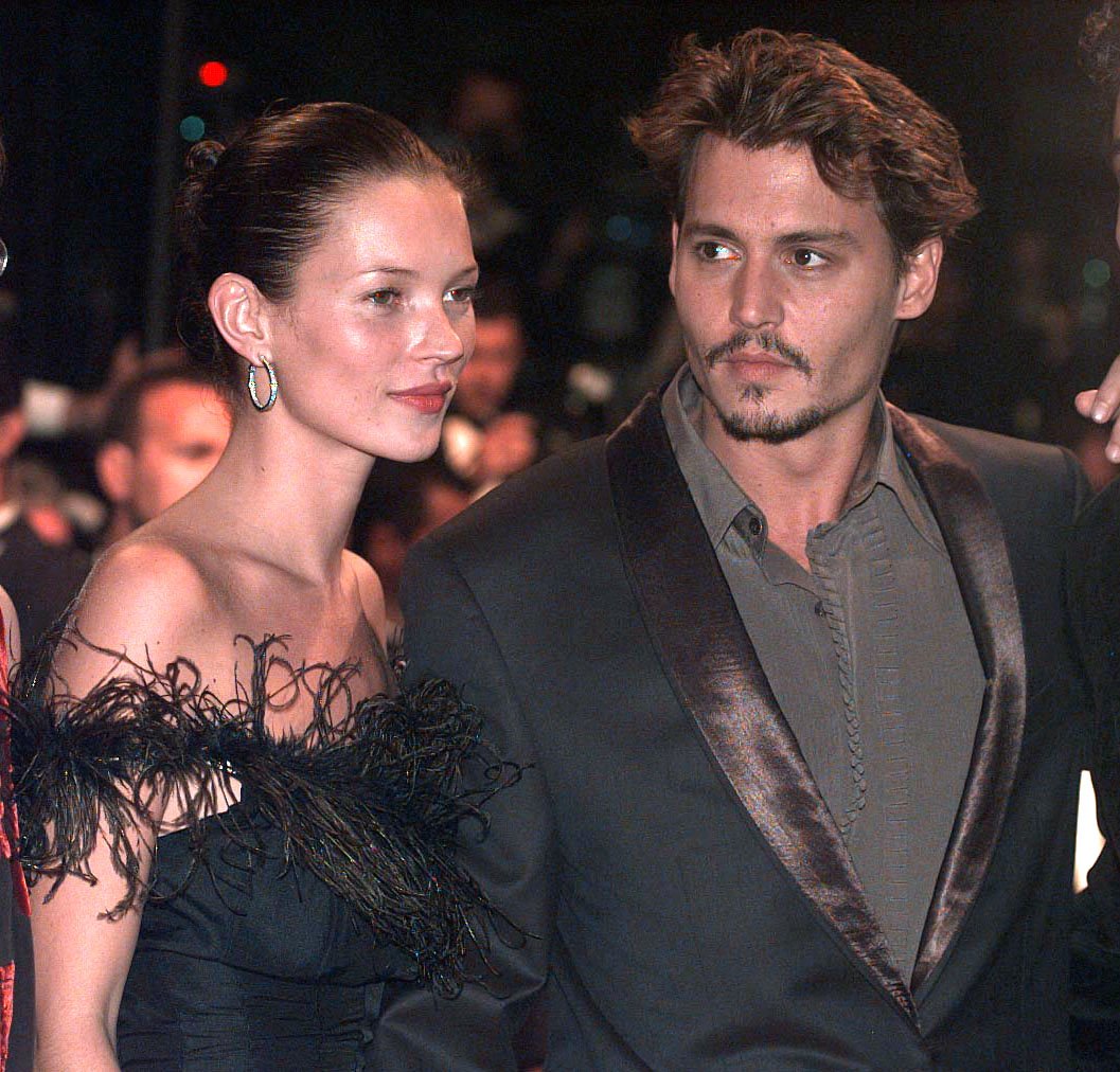 Johnny Depp and Kate Moss at the premiere of "Fear And Loathing In Las Vegas" during the 51st Cannes Film Festival | Source: Getty Images
