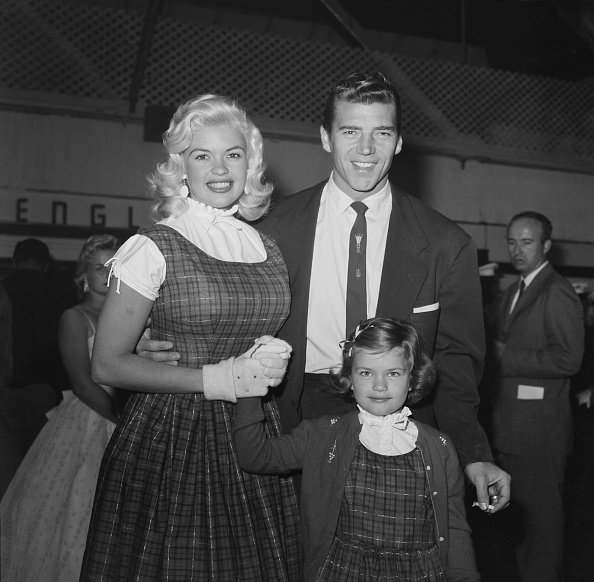Actress Jayne Mansfield with her daughter Jayne Marie Mansfield and Mickey Hargitay during a Christmas Parade party in Los Angeles | Photo: Getty Images