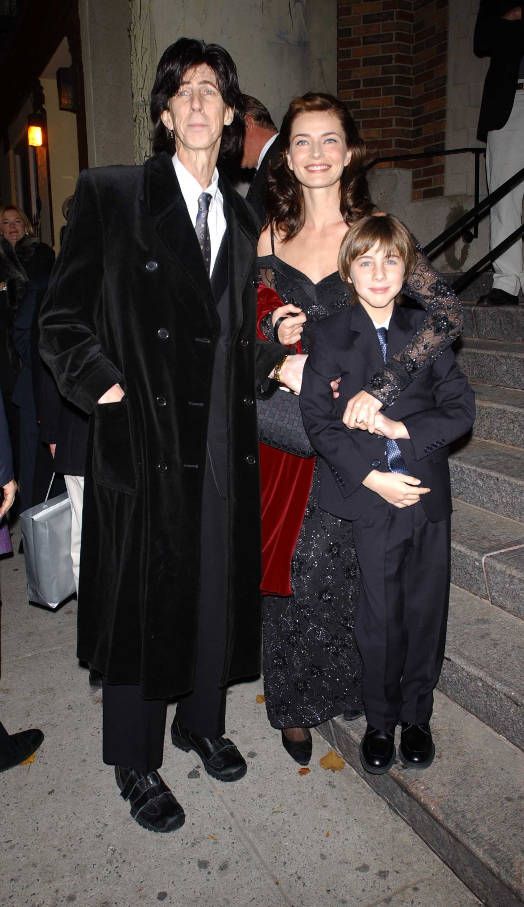 Late Rick Ocassick, Paulina Porizkova and son Jonathan at the Holy Trinty Archdiocesian Cathedral on November 20, 2001 | Photo: Getty Images