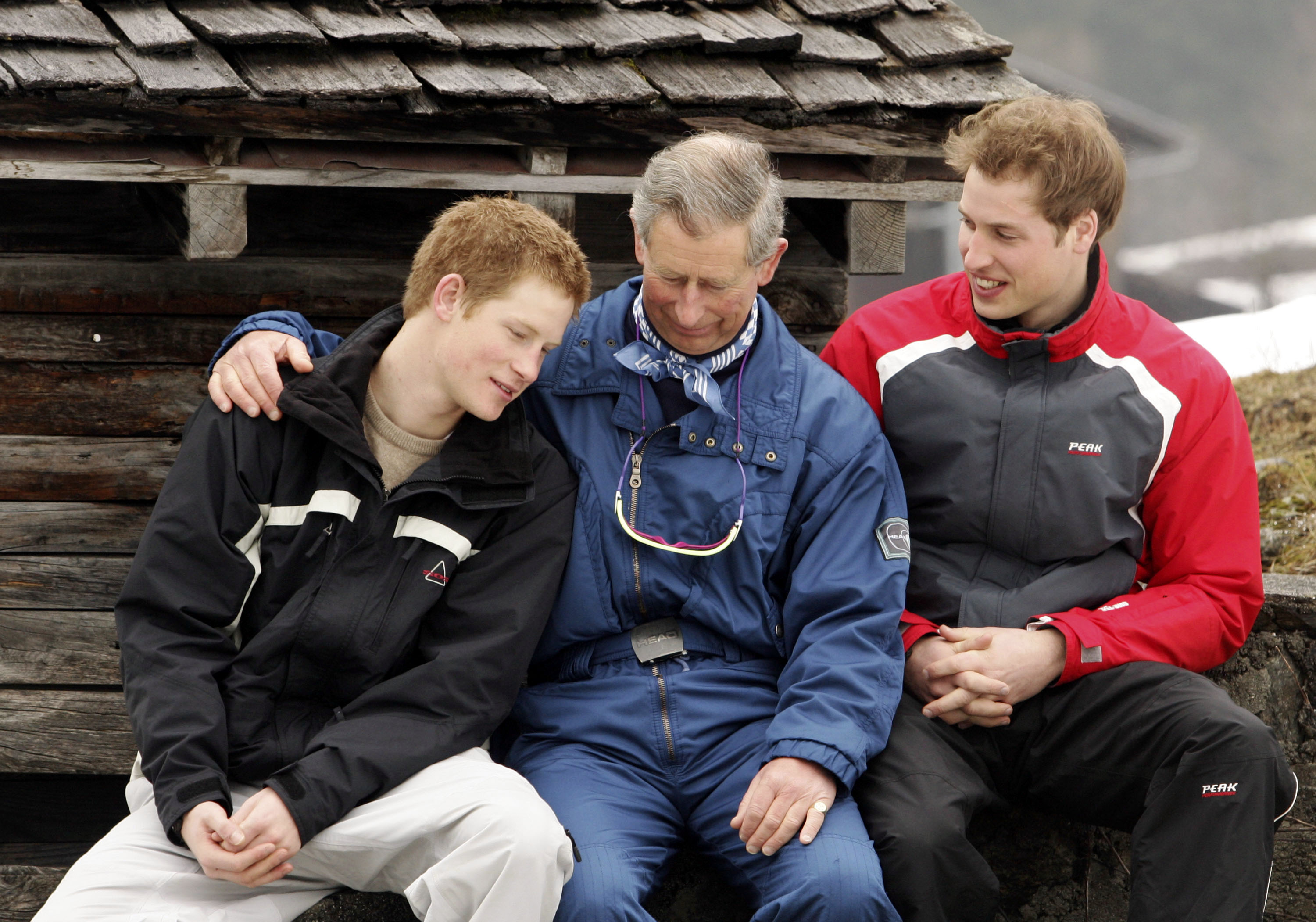 Prince Harry, King Charles III and Prince William during the Royal Family's ski break at Klosters on March 31, 2005 in Switzerland. | Source: Getty Images