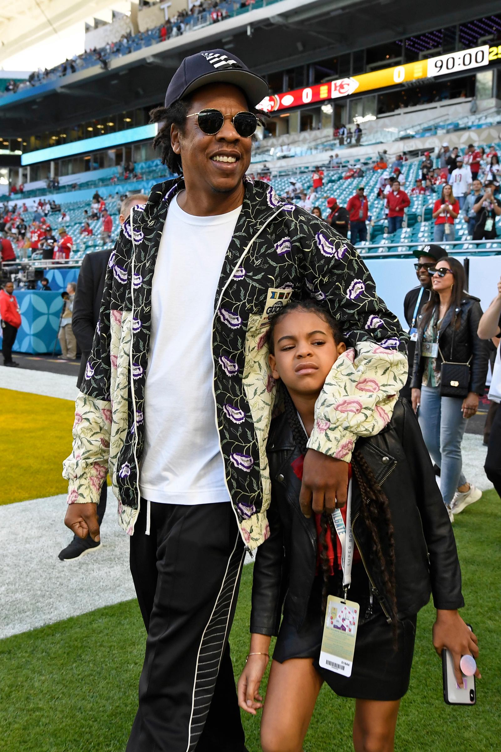 Jay-Z and Blue Ivy Carter tour the field before the start of Super Bowl LIV on February 2, 2020, in Miami Gardens, Florida. | Source: Getty Images