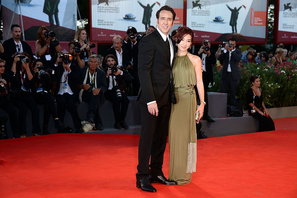 Actor Nicolas Cage and his wife Alice Kim attend 'Joe' Premiere during The 70th Venice International Film Festival at Sala Granden August 30, 2013. | Photo: Getty Images