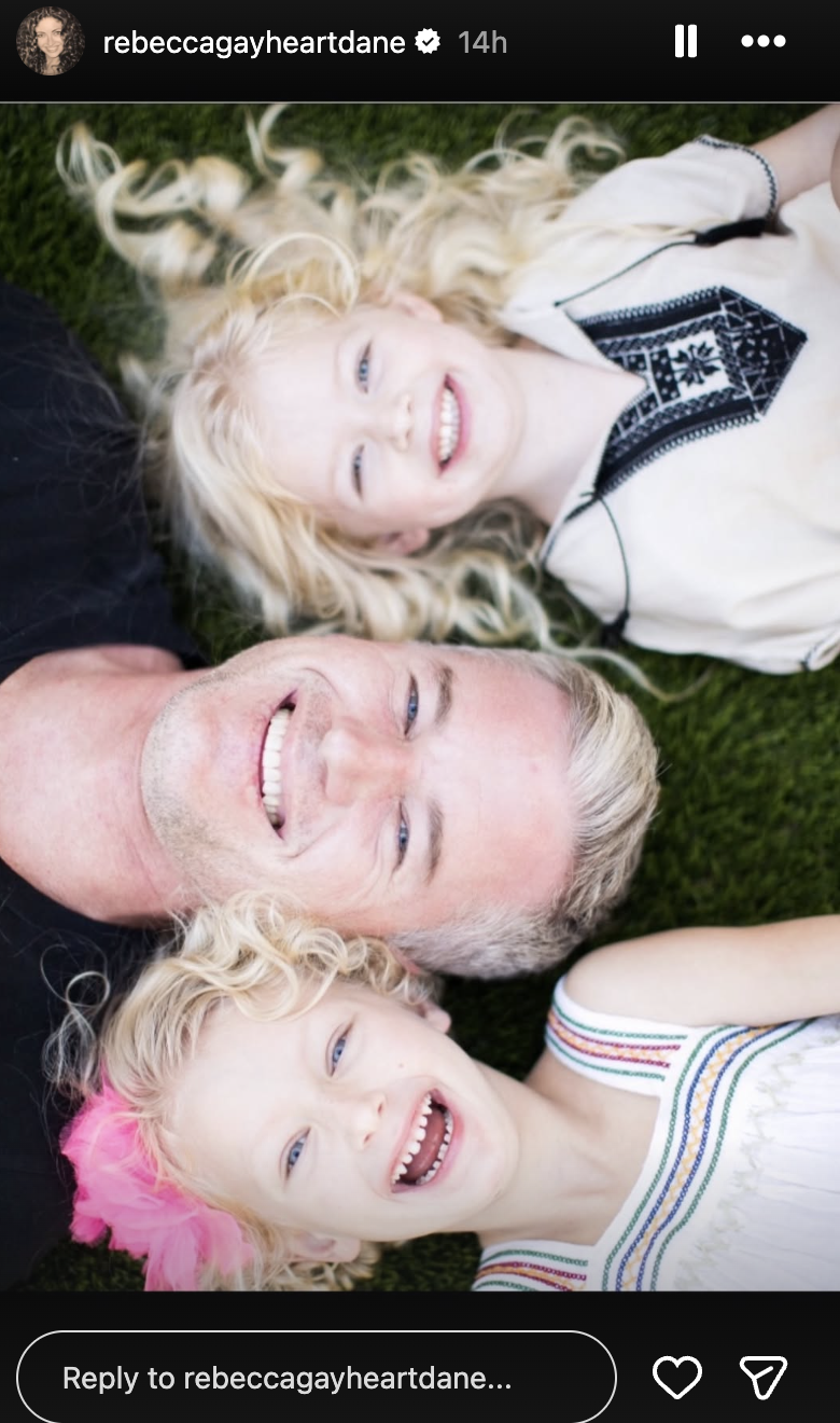 Eric Dane and his daughters, Billie and Georgia Dane, taking photo on grass, on a story posted on February 21, 2026 | Source: Instagram/rebeccagayheartdane