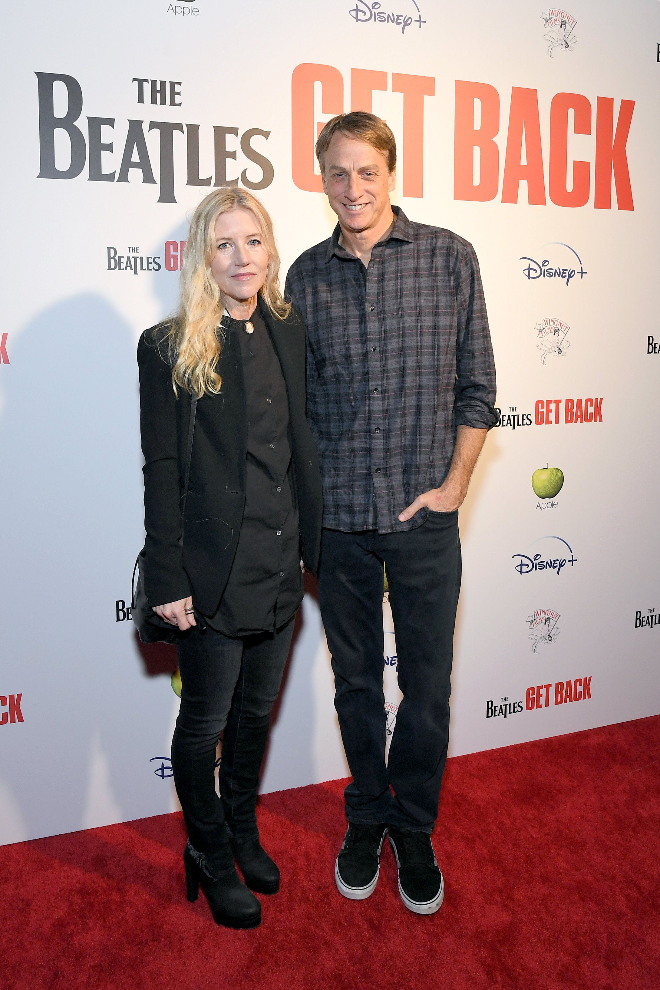 Tony Hawk and his spouse Cathy Goodman attend the Exclusive 100-Minute Sneak Peek of Peter Jackson's The Beatles: Get Back at El Capitan Theatre on November 18, 2021, in Hollywood, California. | Source: Getty Images