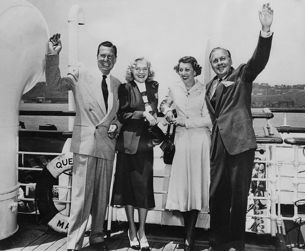 Phil Harris, his wife, Alice Faye with actor Jack Benny and his wife, Mary Livingstone, on board the liner 'Queen Mary' on 12th June 1950 | Photo: Getty Images