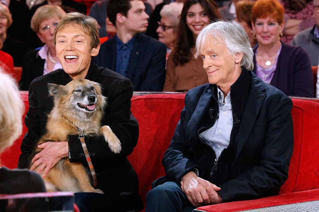 Le chanteur Dave et son compagnon Patrick Loiseau | photo : Getty Images