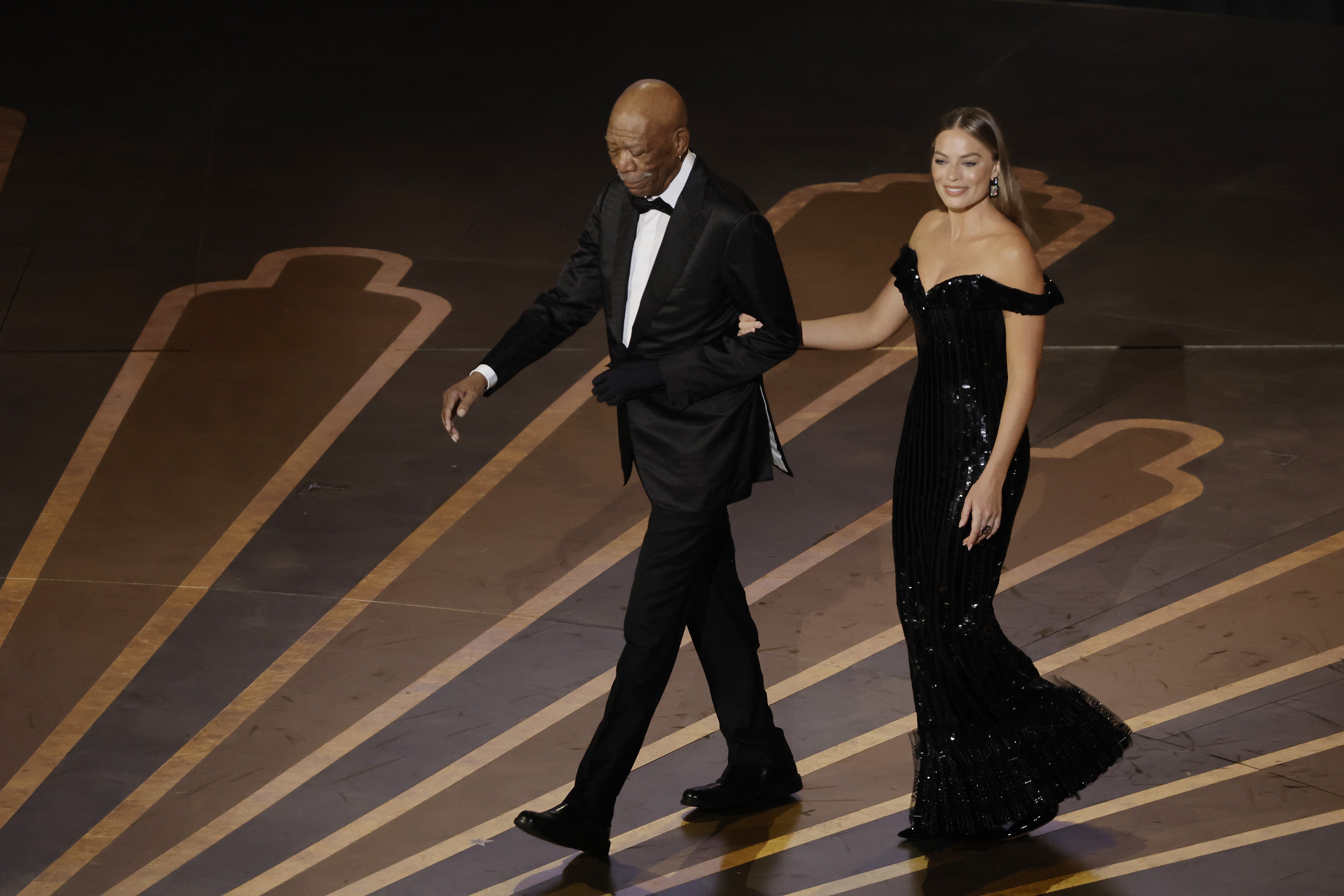 Morgan Freeman and Margot Robbie at the 95th Annual Academy Awards in California in 2023 | Source: Getty Images