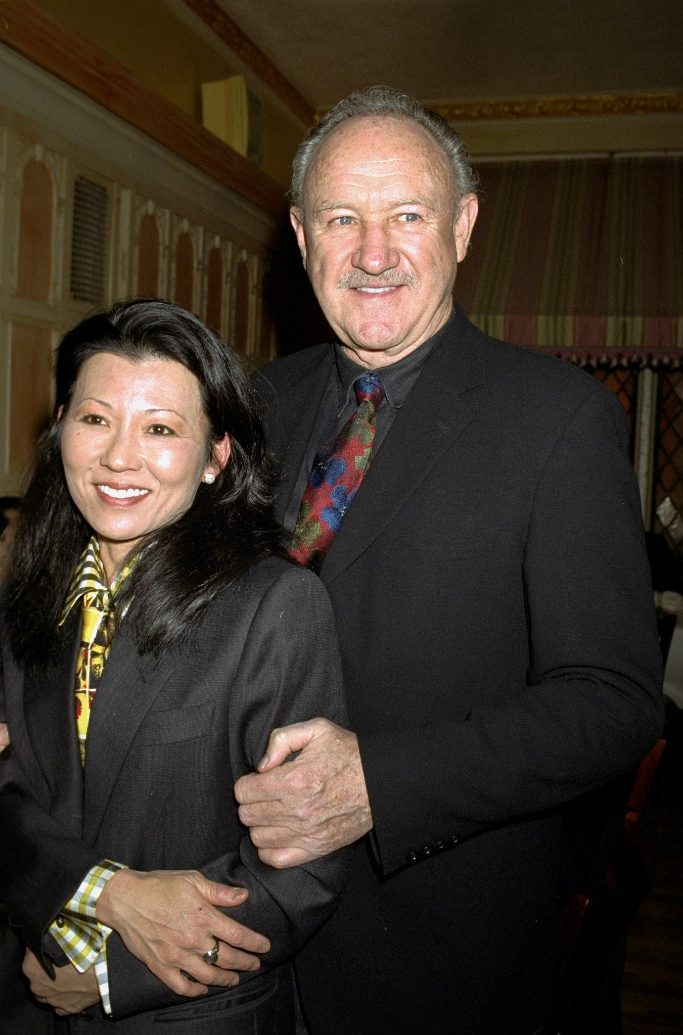 Actor Gene Hackman with wife Betsy Arakawa at the United Celebral Palsy of New York City's 15th annual Champagne Stakes at Etoile restaurant on E. 56th St, circa 2000 | Source: Getty Images