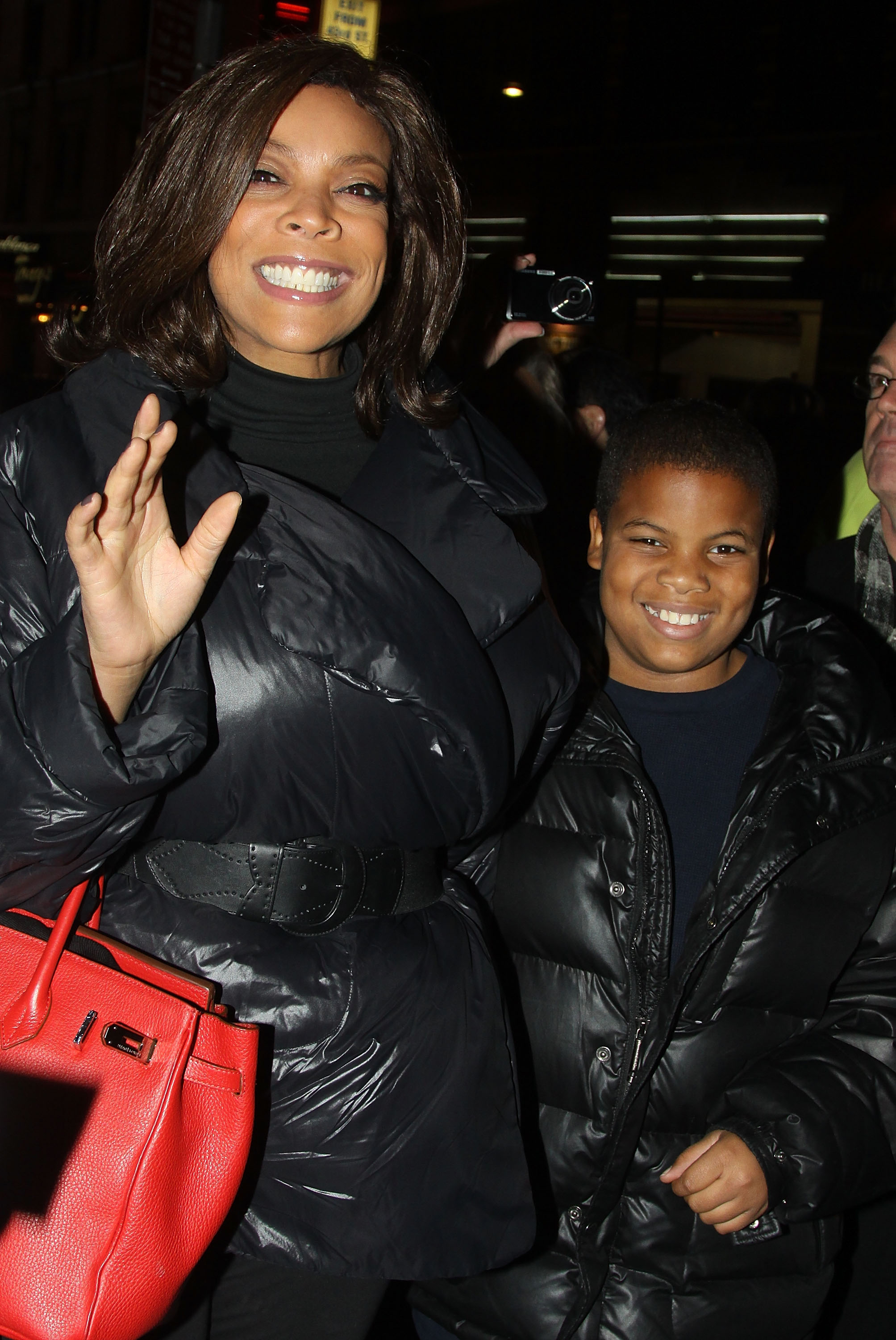 Wendy Williams and her son pose at The Opening Night of "The Pee-Wee Herman Show" on Broadway on November 11, 2010, in New York City | Source: Getty Images