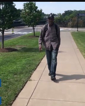 Picture of Luther Younger walking to see his wife at the hospital | Source: Youtube/CBS News