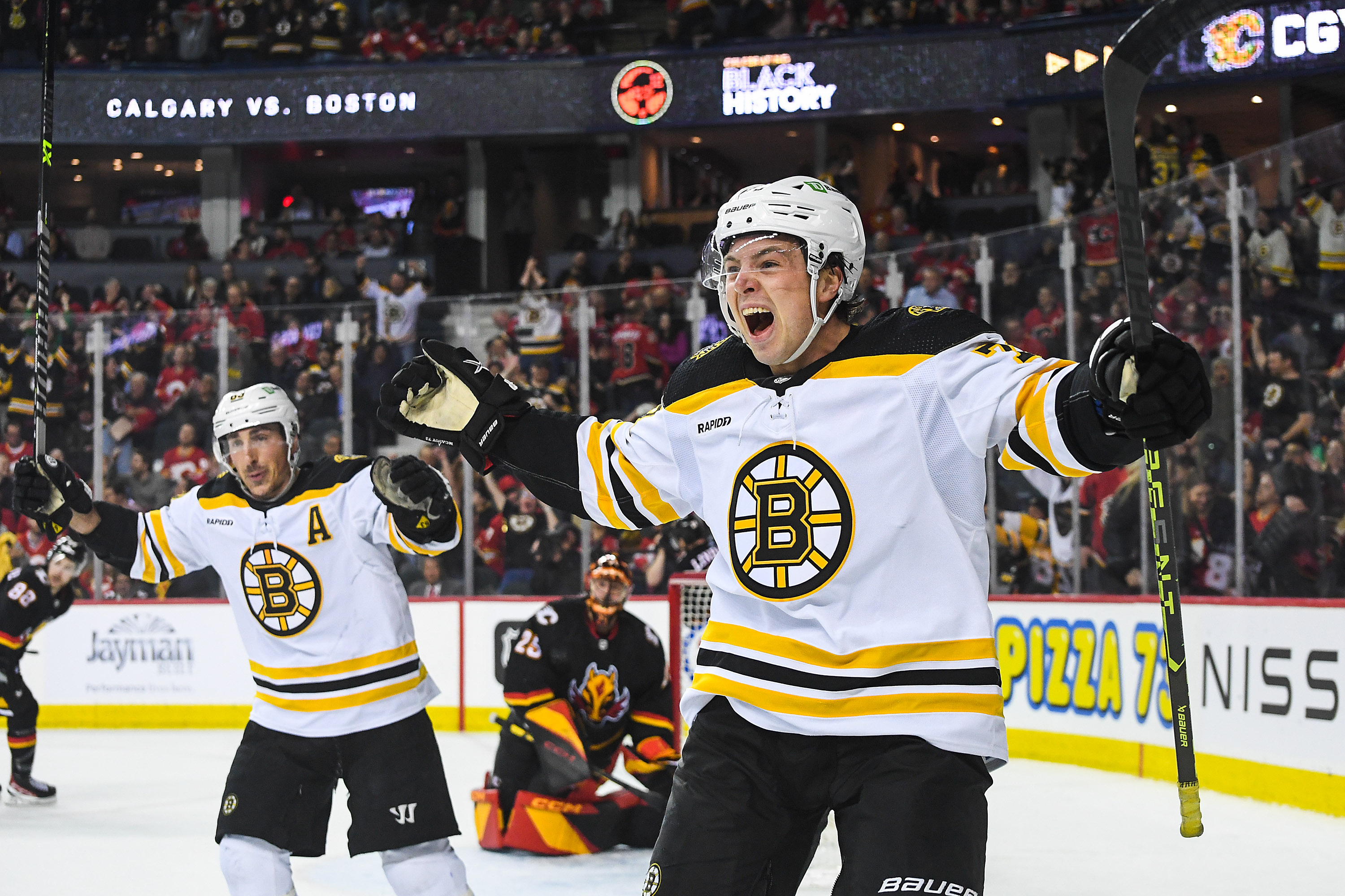 Charlie McAvoy #73 of the Boston Bruins celebrates after scoring the game-winning goal against the Calgary Flames during the overtime period of an NHL game at Scotiabank Saddledome on February 28, 2023, in Calgary, Alberta, Canada | Source: Getty Images