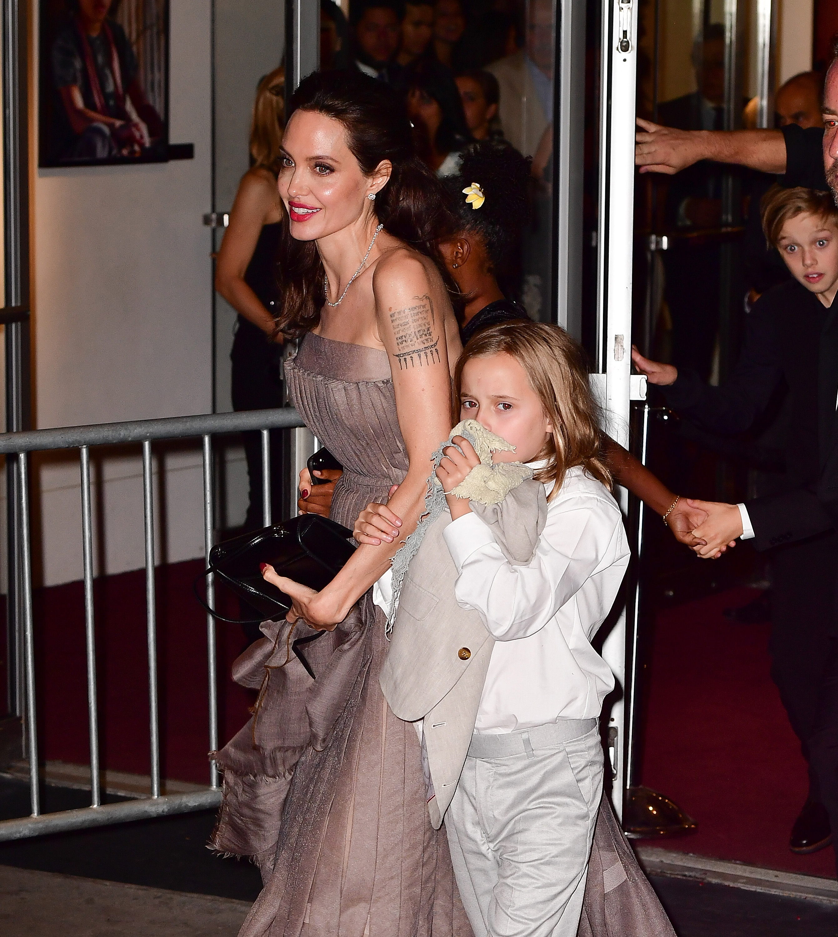 Angelina Jolie and Vivienne Jolie-Pitt leave the New York premiere of 'First They Killed My Father' at the DGA Theater on September 14, 2017 in New York City | Source: Getty Images