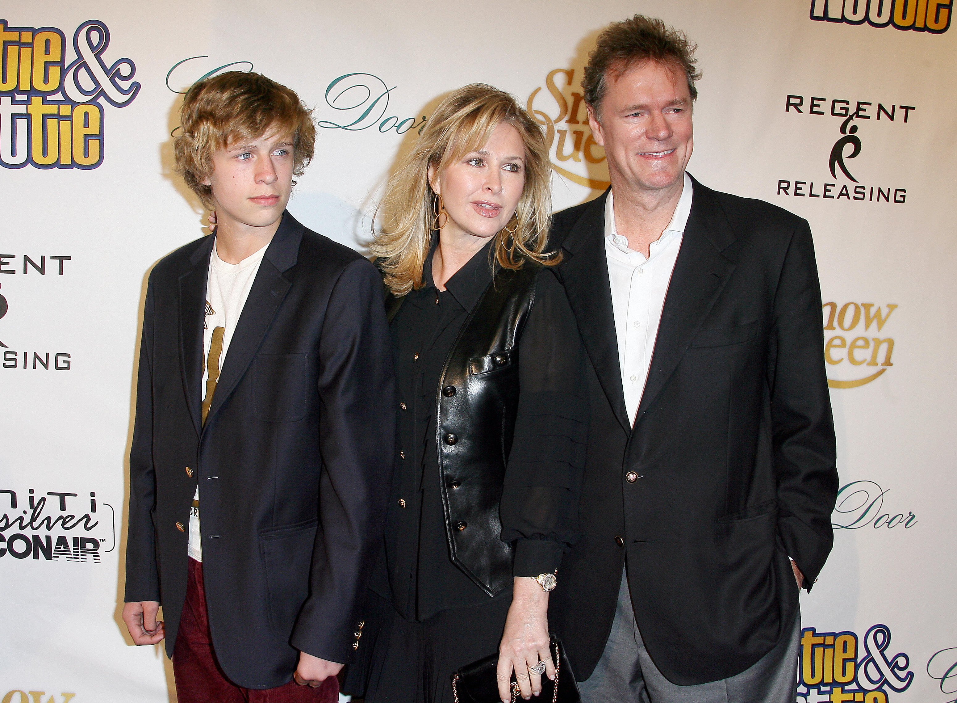 Conrad Hughes Hilton, Kathy Hilton and Rick Hilton arrive at the Premiere of "The Hottie and The Nottie," on February 4, 2008 at the Egyptian Theater in Los Angeles, California. | Source: Getty Images