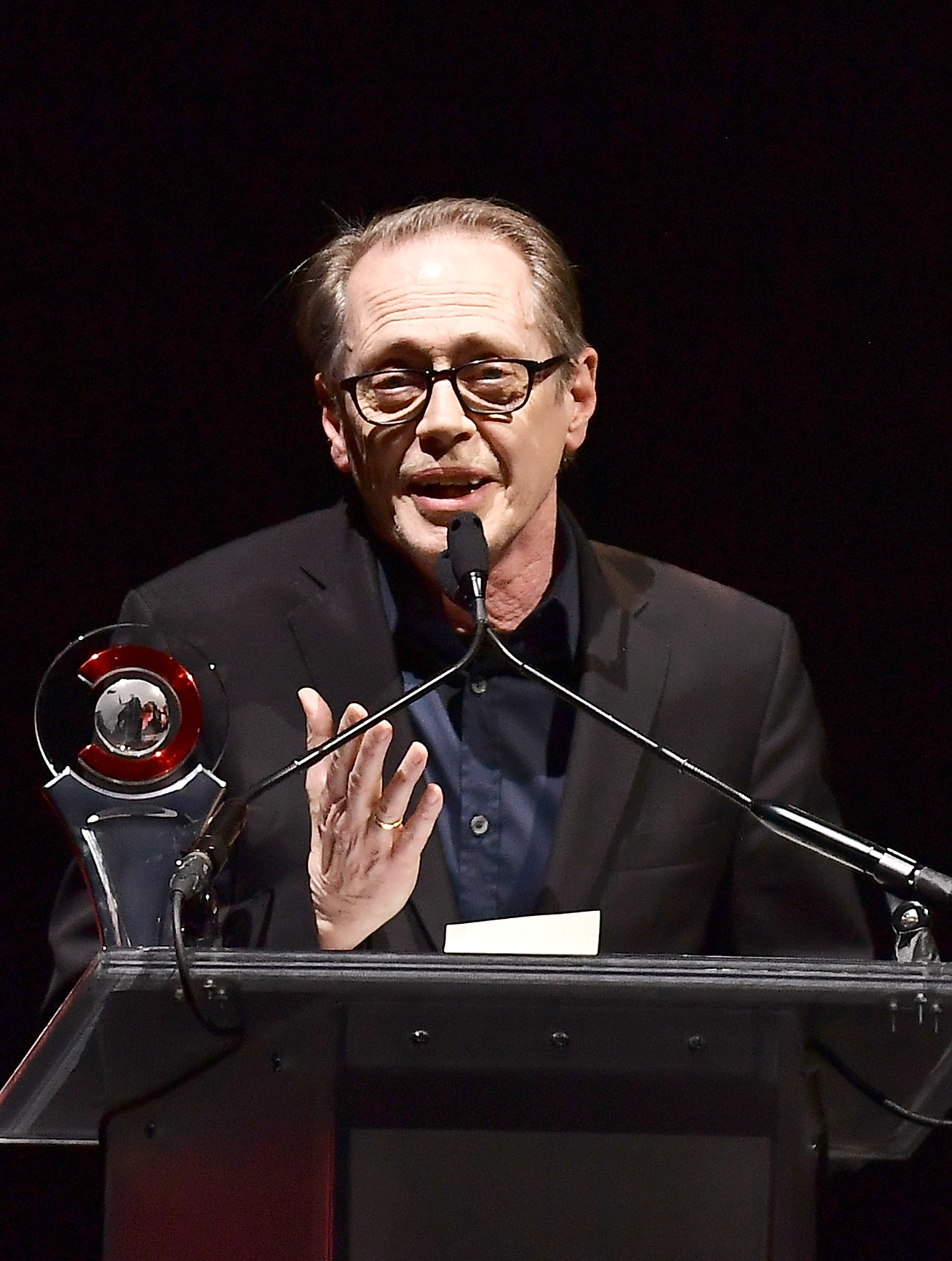 Steve Buscemi gives a speech at The CinemaCon Big Screen Achievement Awards after accepting the Cinema Icon Award in Las Vegas, Nevada, on April 4, 2019 | Source: Getty Images