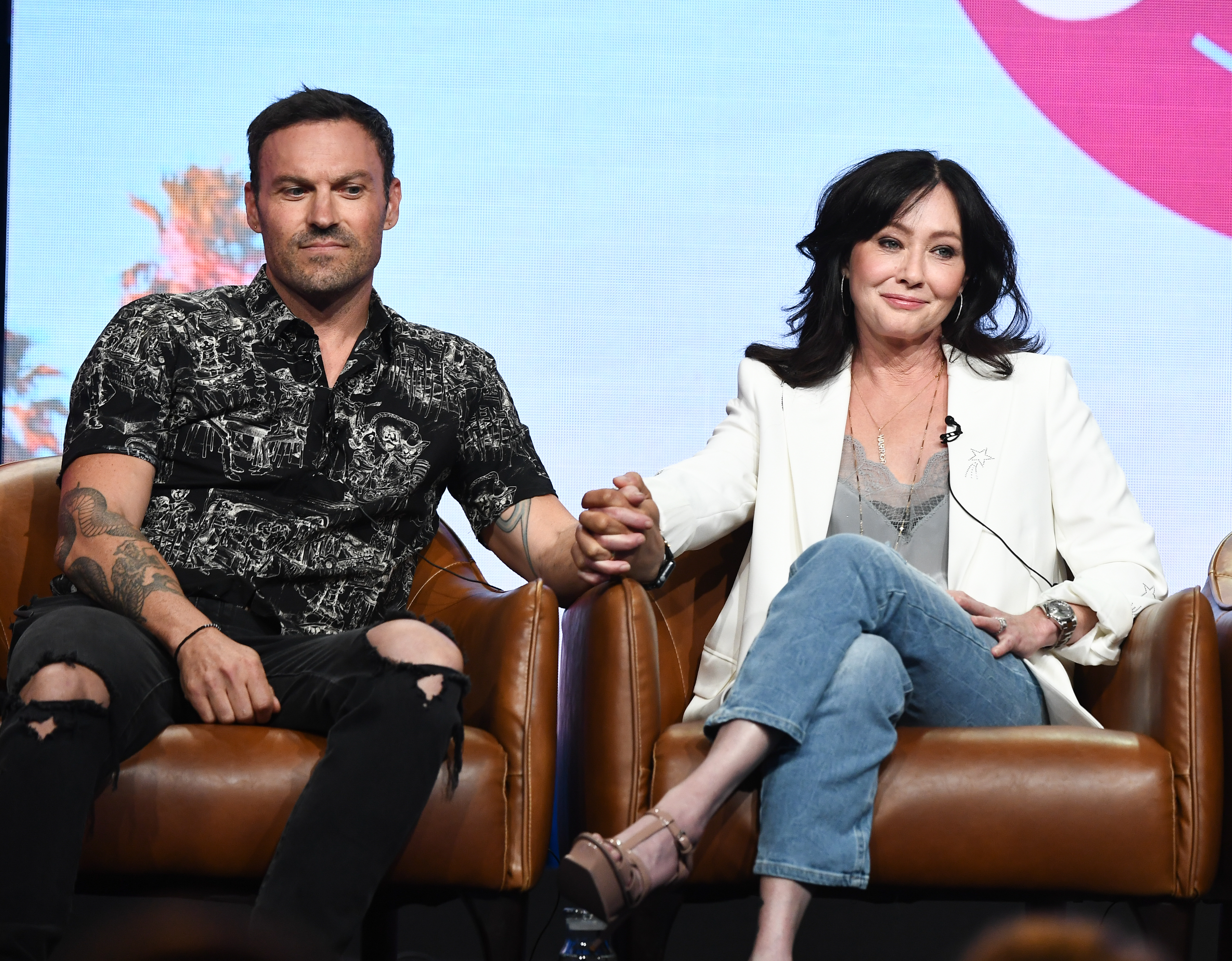 Brian Austin Green and Shannen Doherty onstage during "BH90210'" TV show panel, TCA Summer Press Tour on August 7, 2019 in Los Angeles | Source: Getty Images
